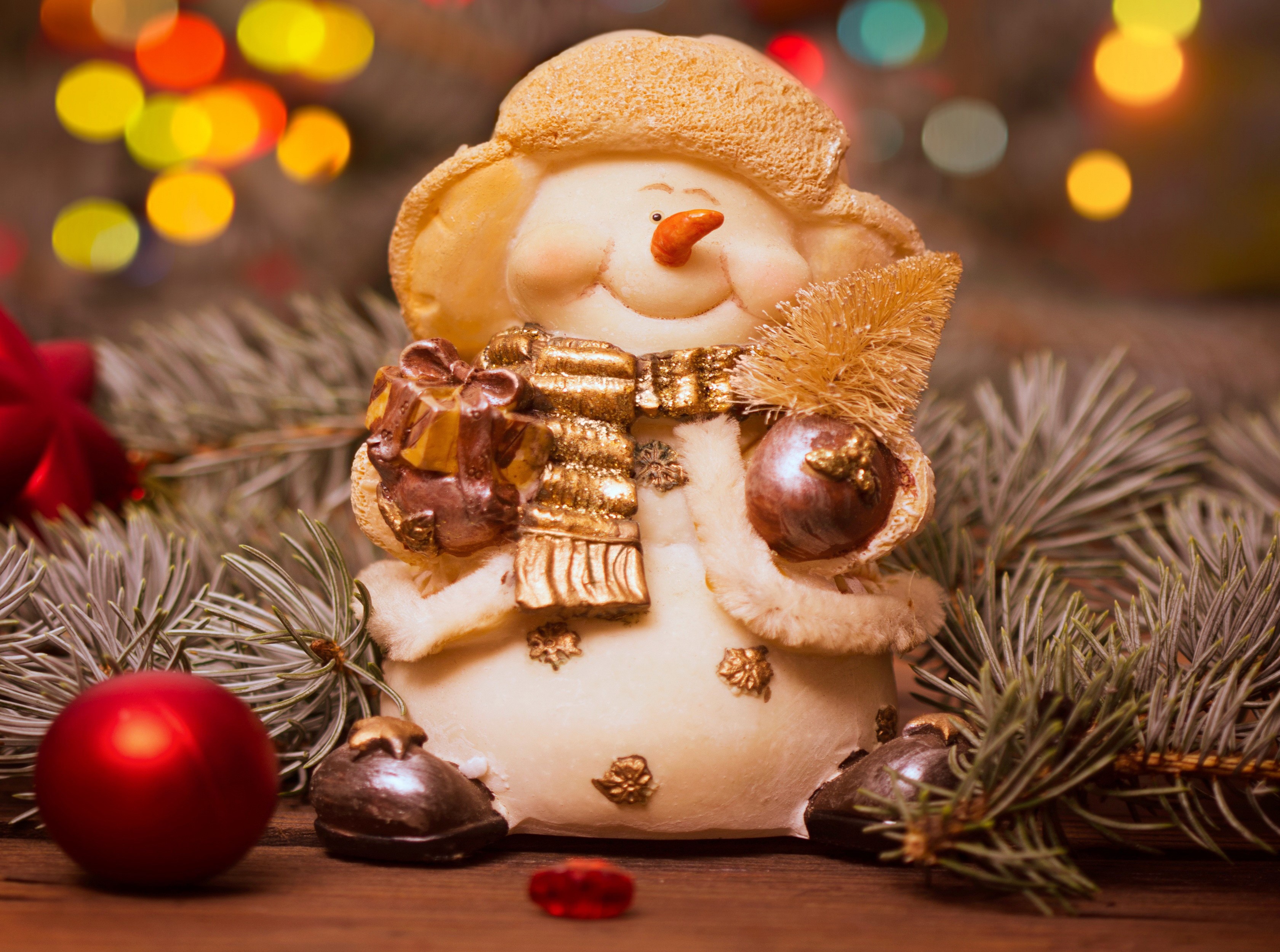 Christmas snowman decoration with pine branches and ornaments HD Wallpaper