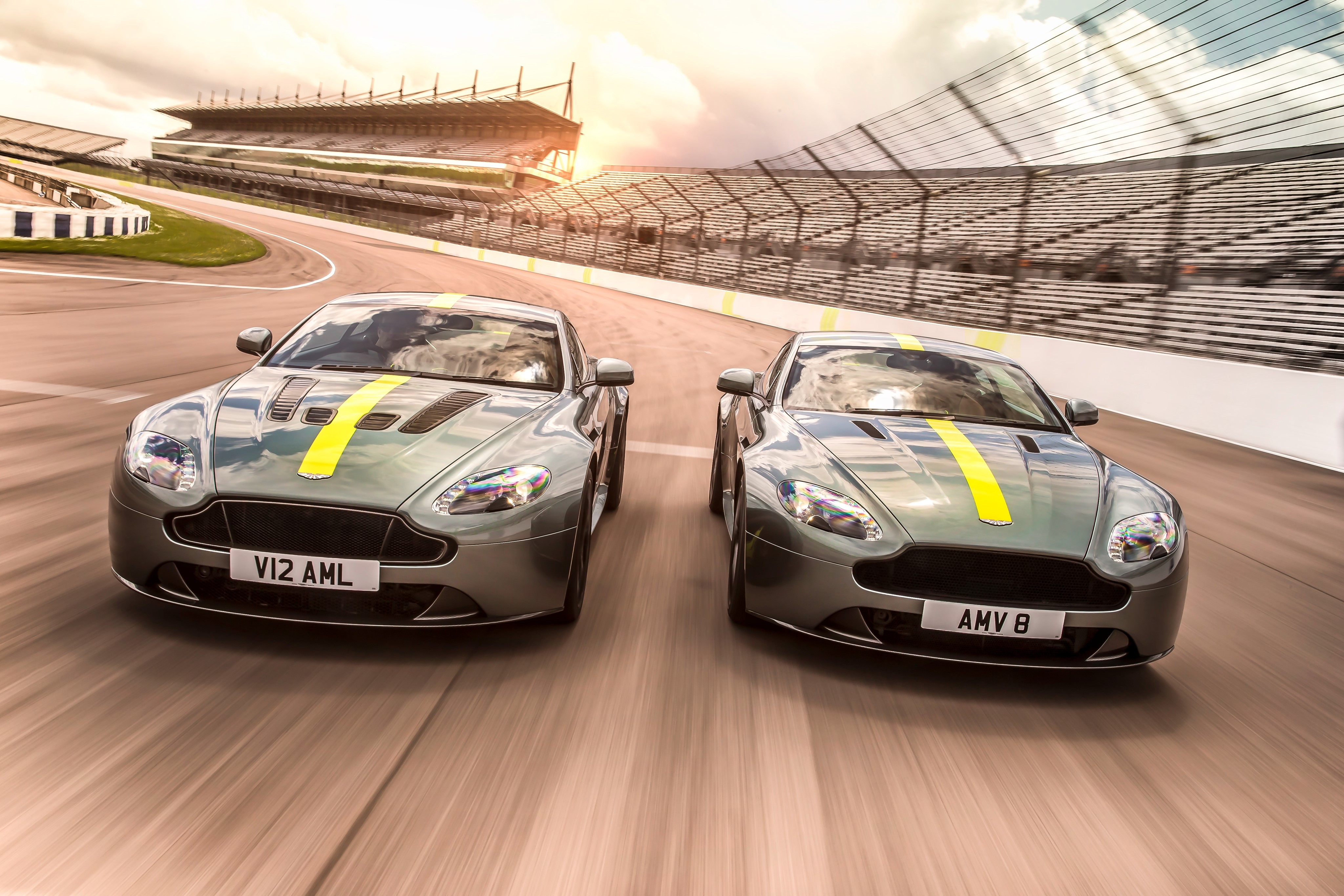 Two Aston Martin Vantage AMR cars on a race track HD Wallpaper
