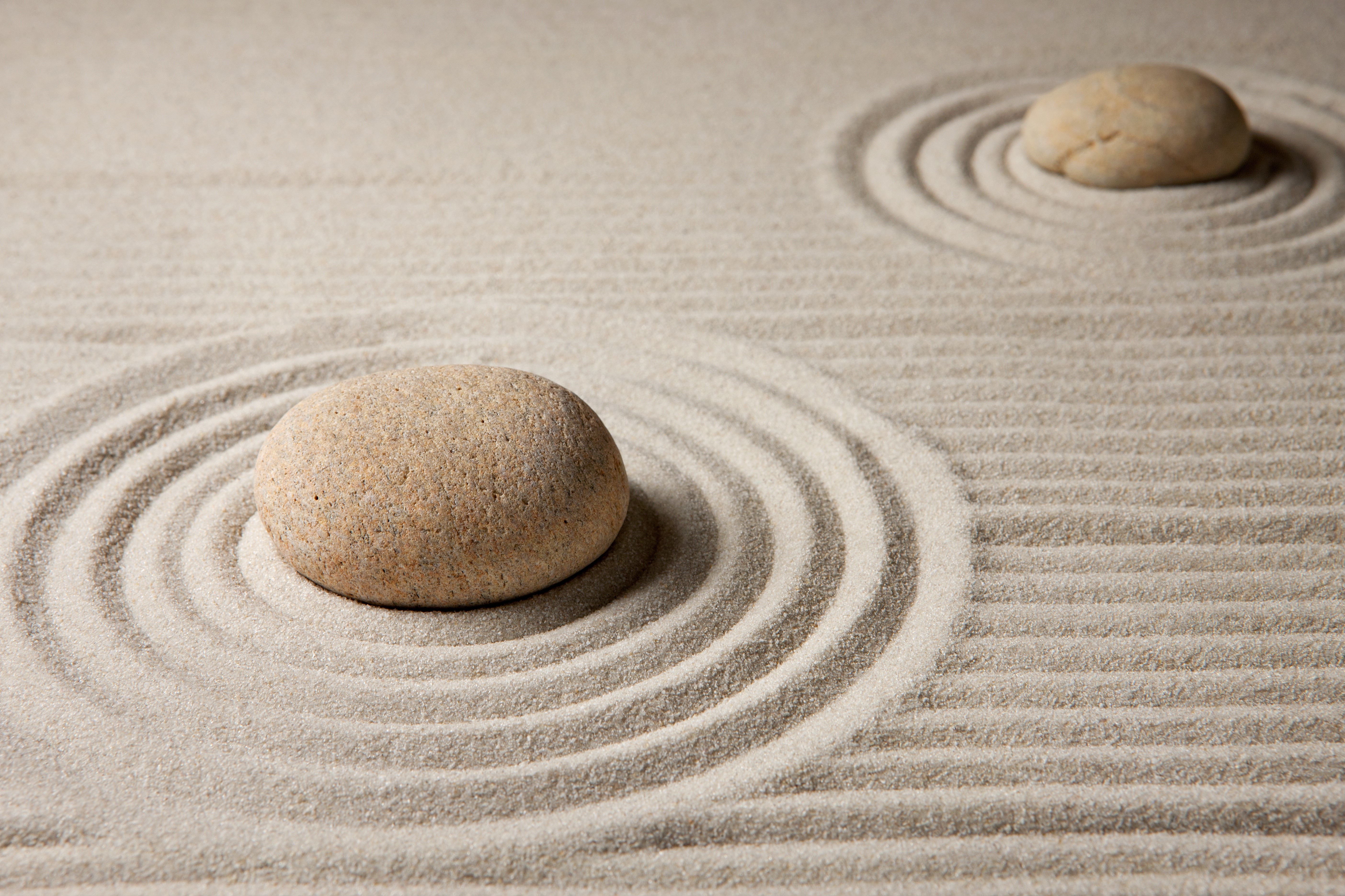 Zen garden with stones and sand circles HD Wallpaper