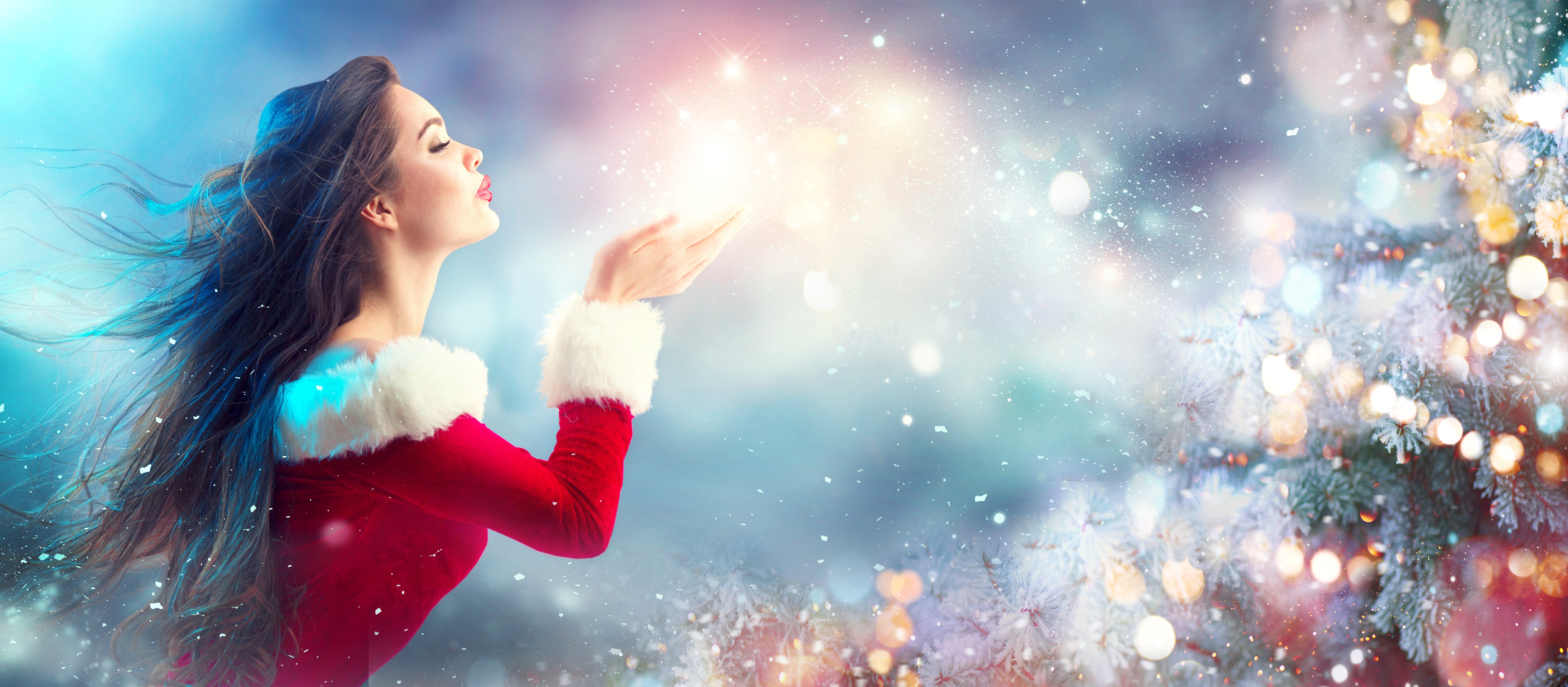 Woman in Santa Costume Blowing Glitter HD Wallpaper