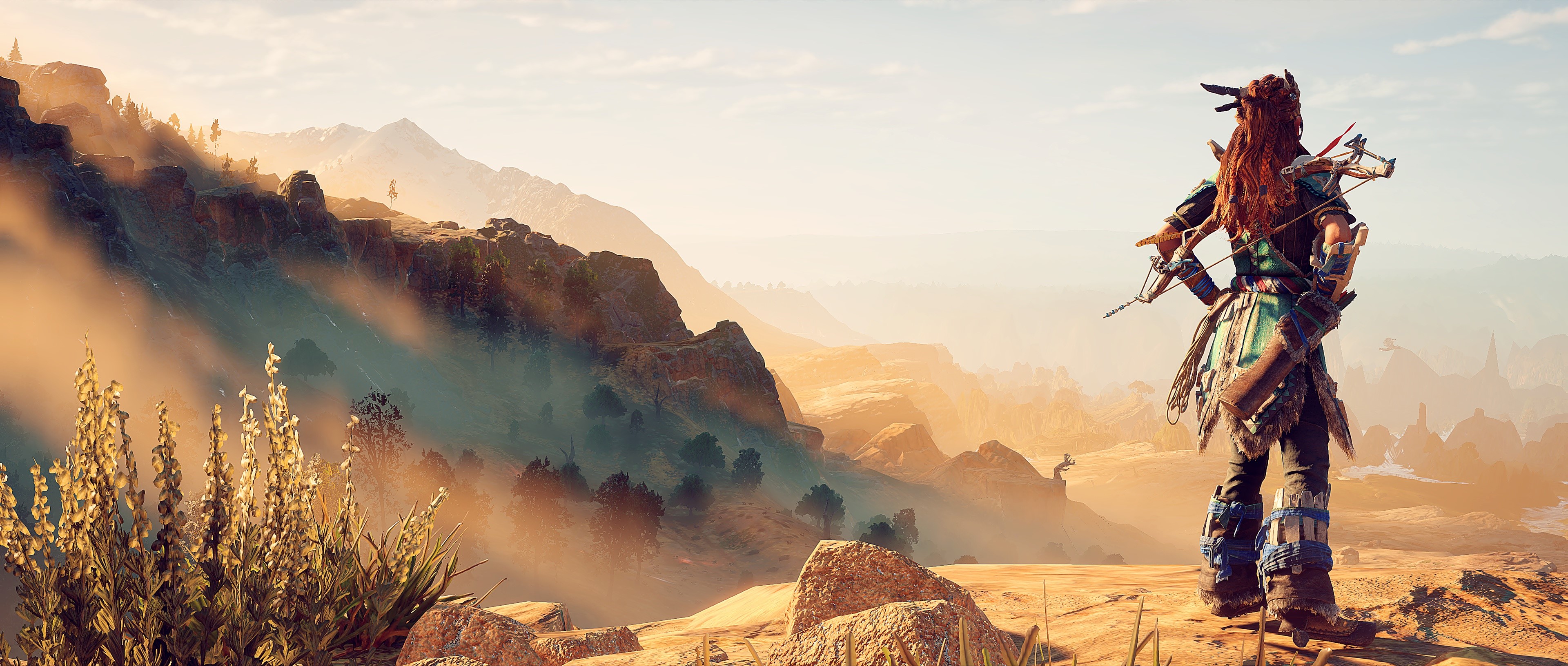 Aloy from Horizon Zero Dawn in a mountainous landscape HD Wallpaper