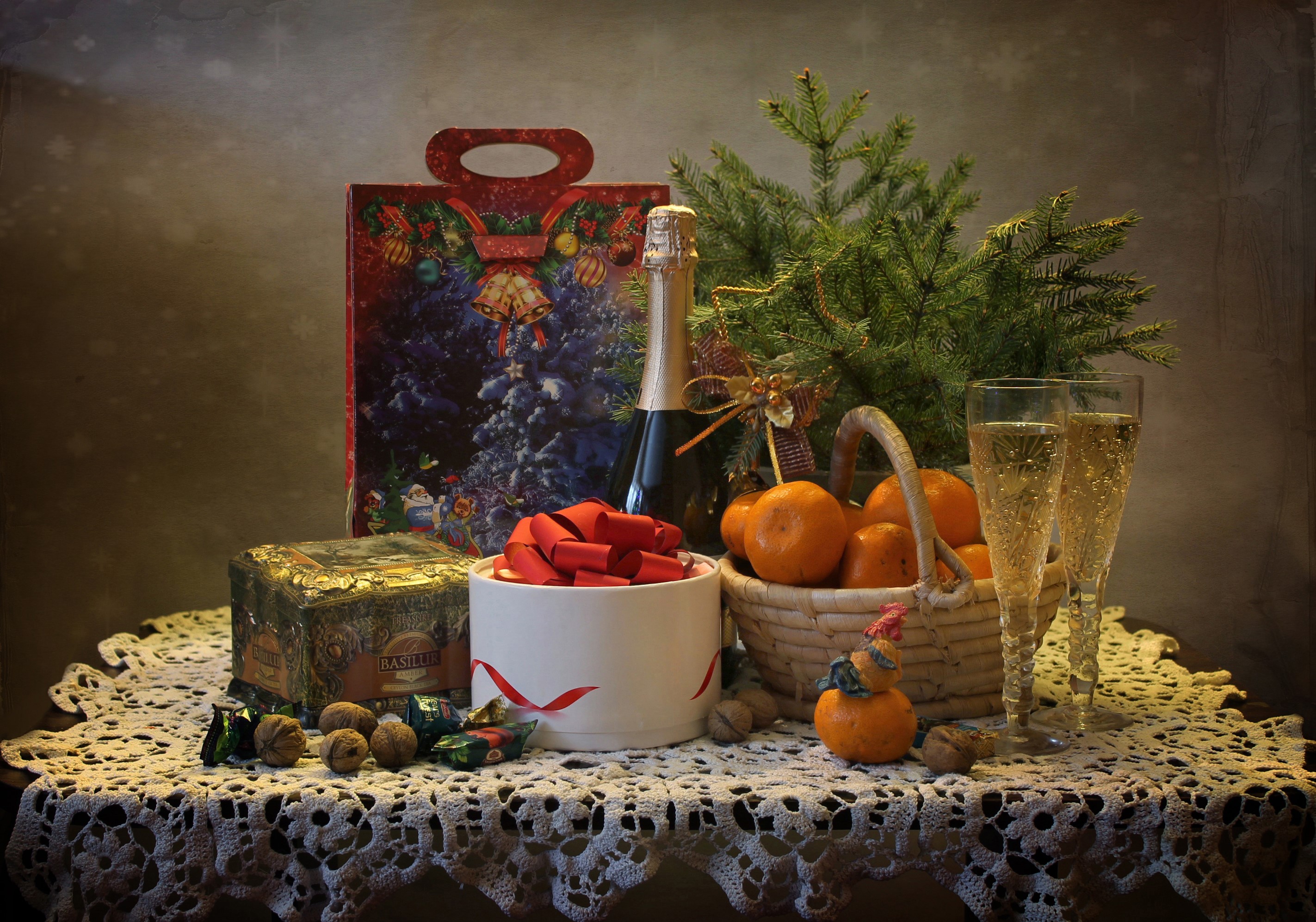 Christmas still-life with champagne, mandarins, and gifts HD Wallpaper