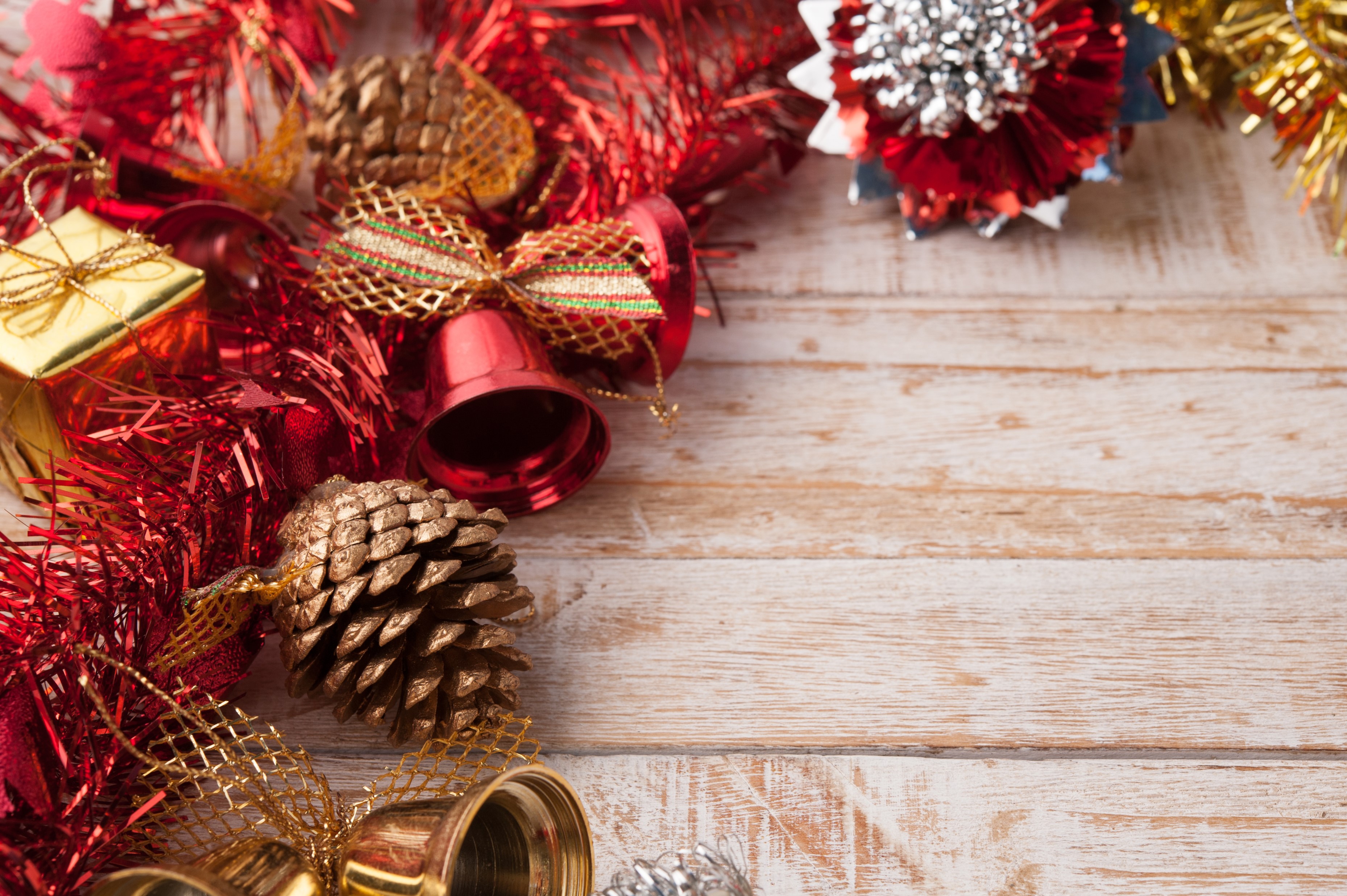 Christmas decorations with pine cones and bells HD Wallpaper