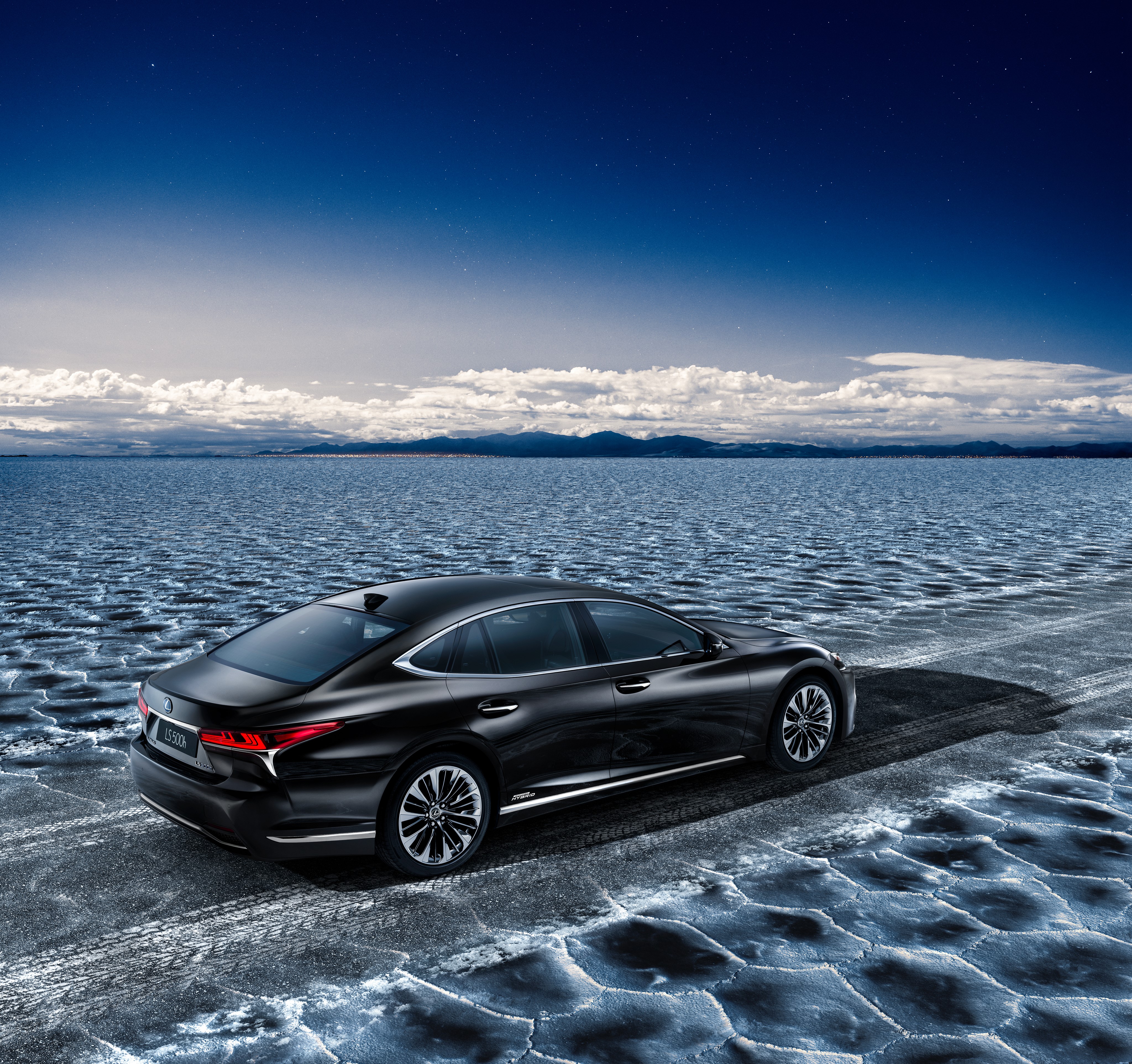 Black Lexus LS 500h on a salt flat HD Wallpaper