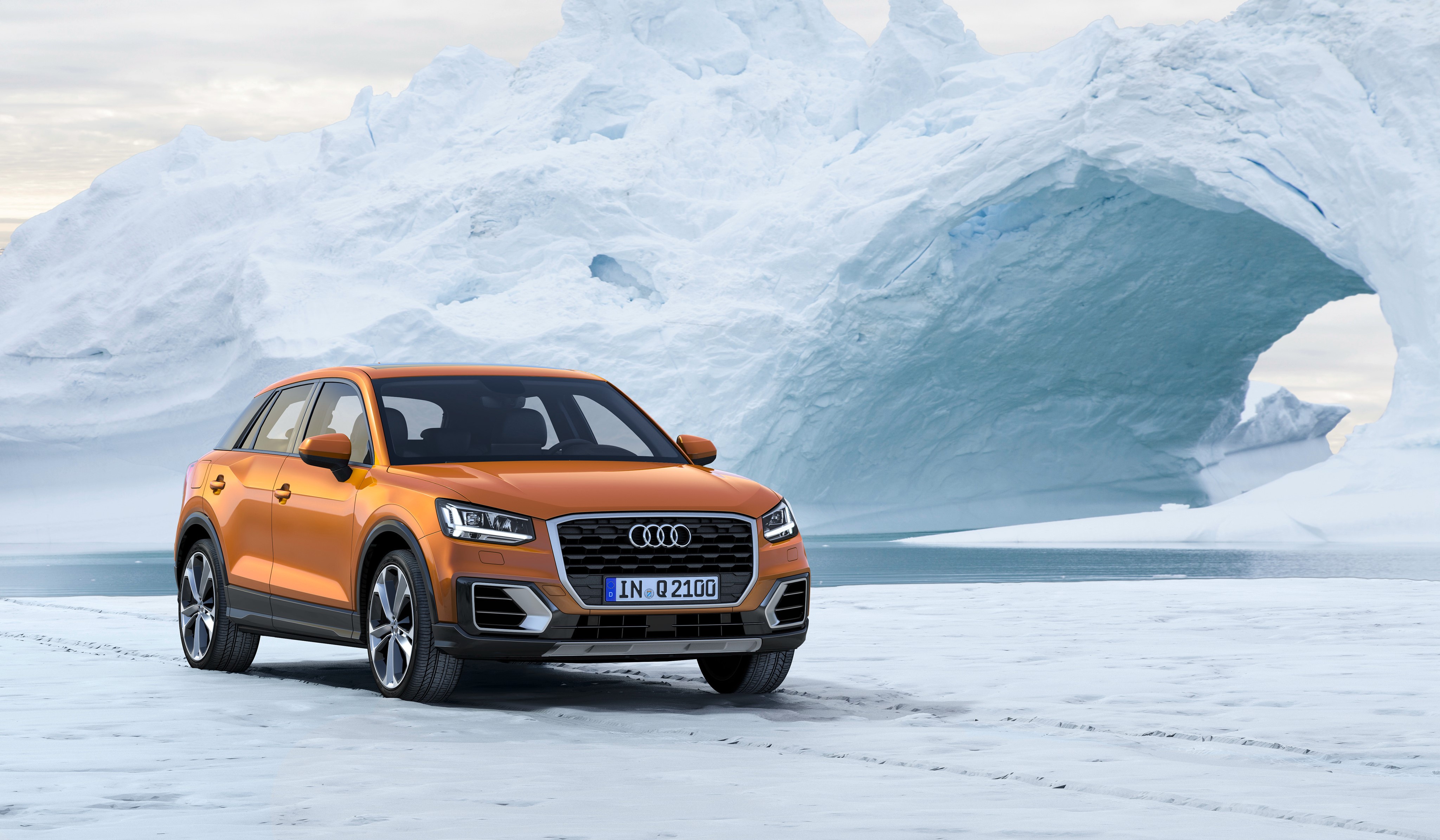 Audi Q2 TDI quattro in winter landscape HD Wallpaper
