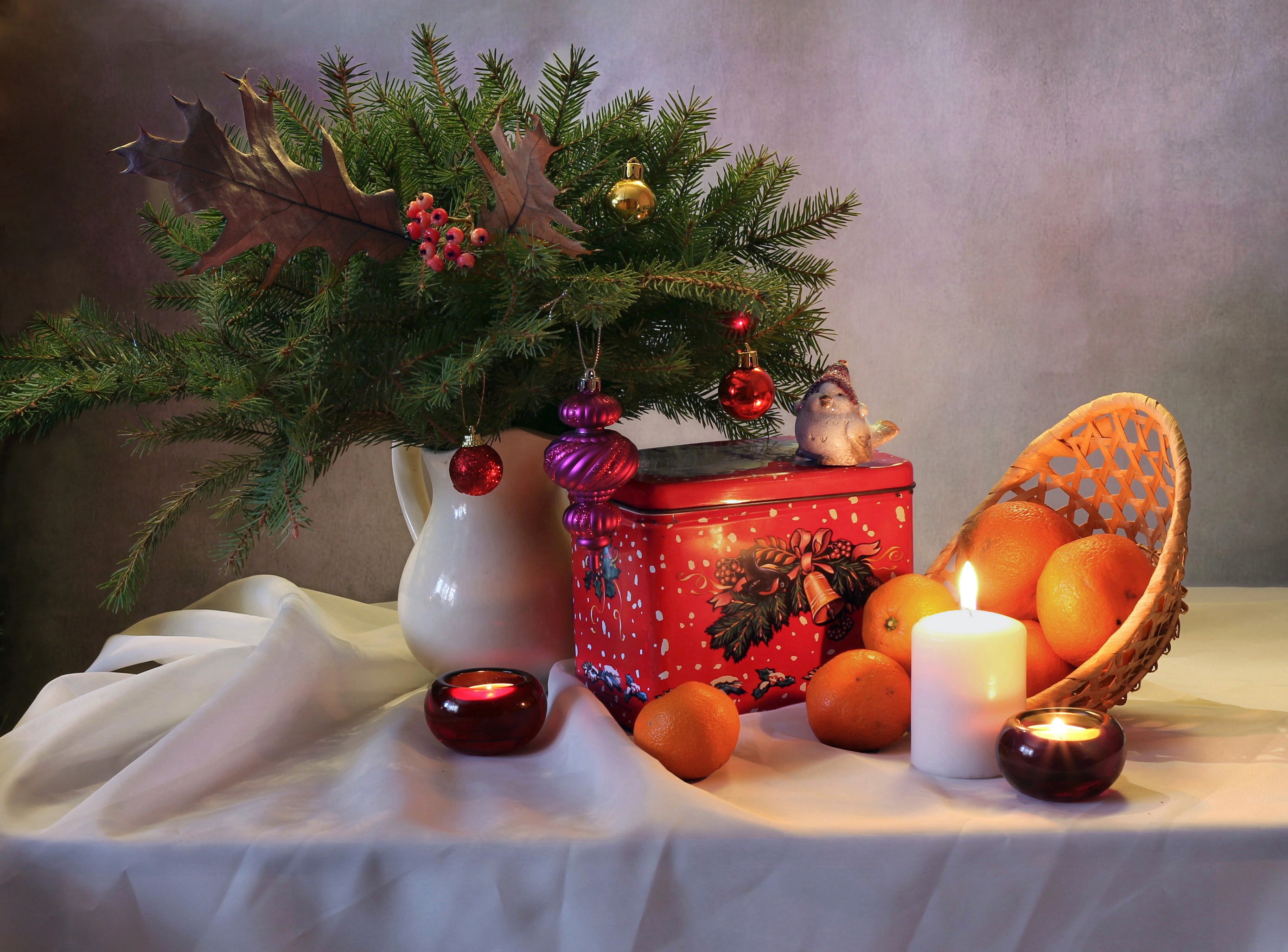 Christmas still-life with fir branches, mandarins, and candles HD Wallpaper