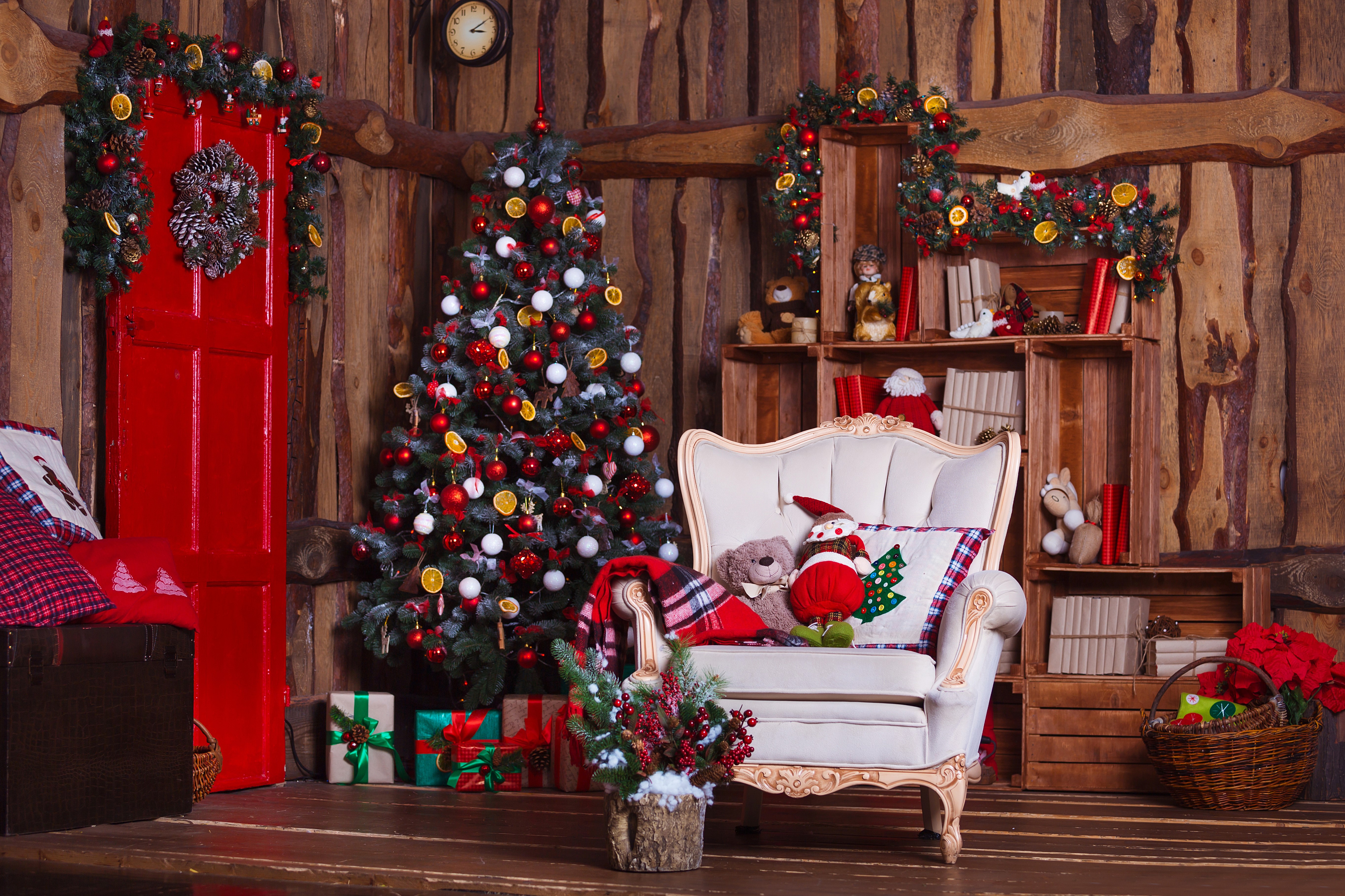 Christmas tree and armchair with gifts HD Wallpaper