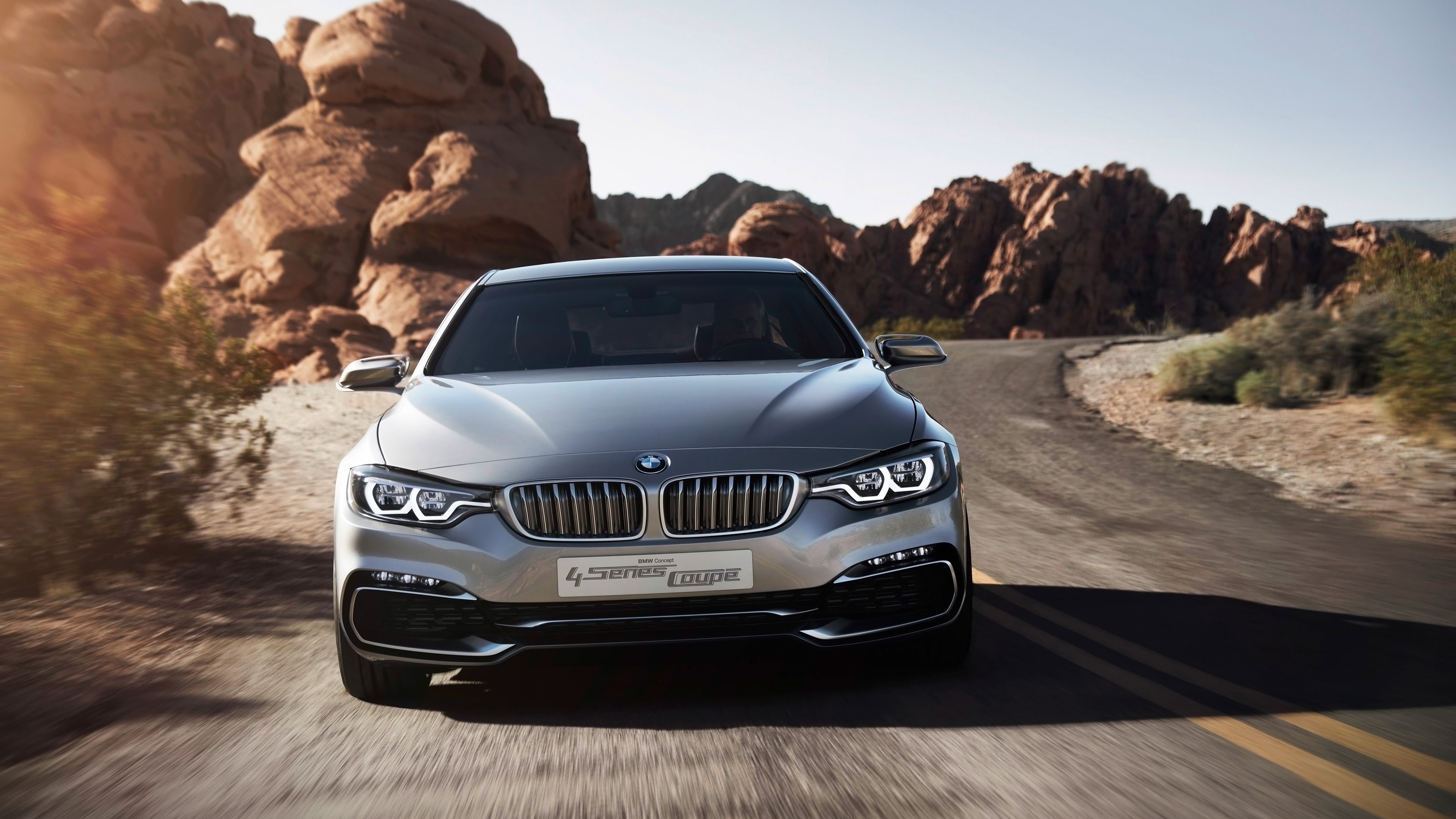 BMW 4 Series Coupe Concept Driving on Desert Road HD Wallpaper