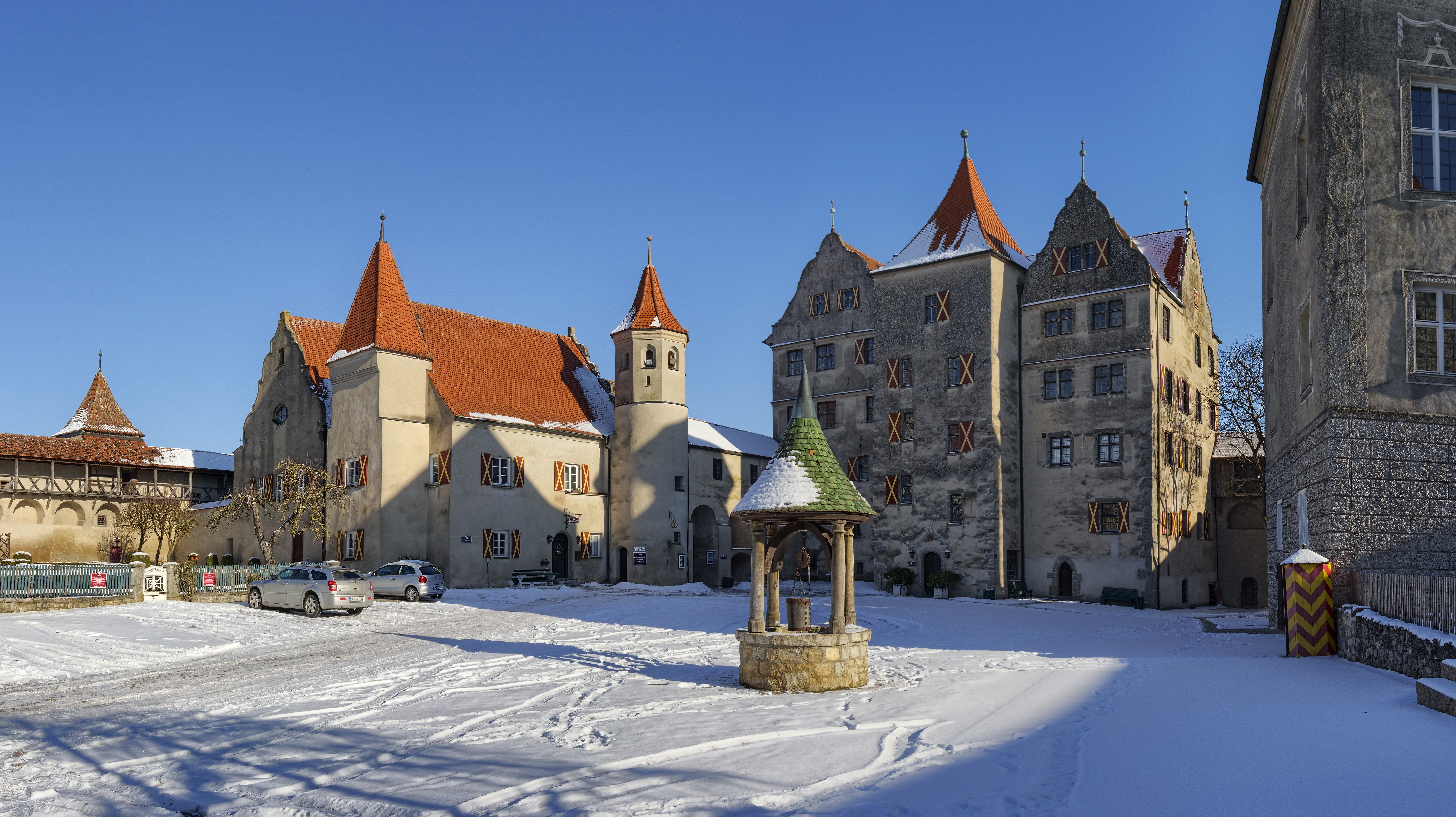Harburg Castle courtyard in winter, Germany HD Wallpaper