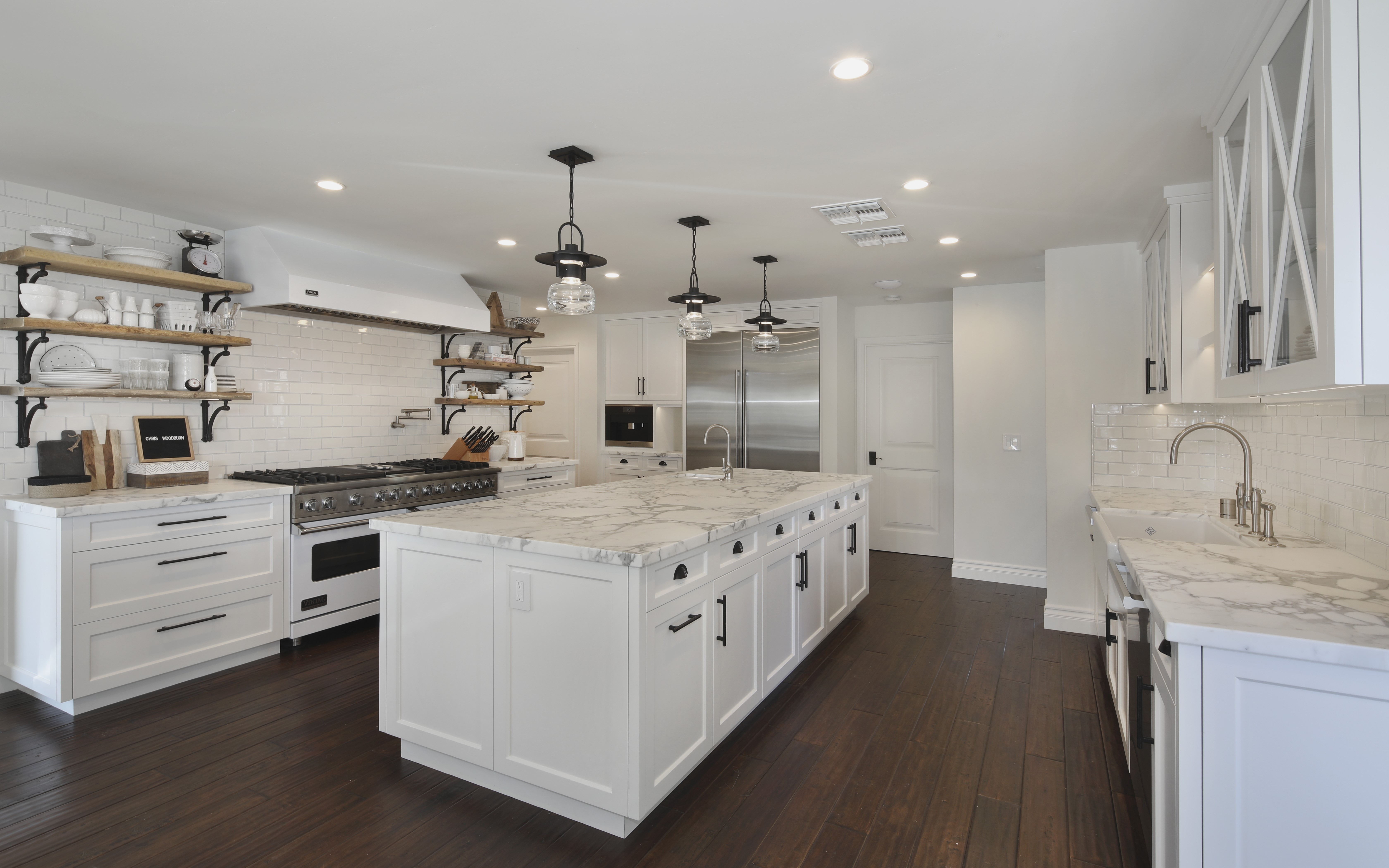 Modern White Kitchen with Marble Island and Dark Wood Floors HD Wallpaper