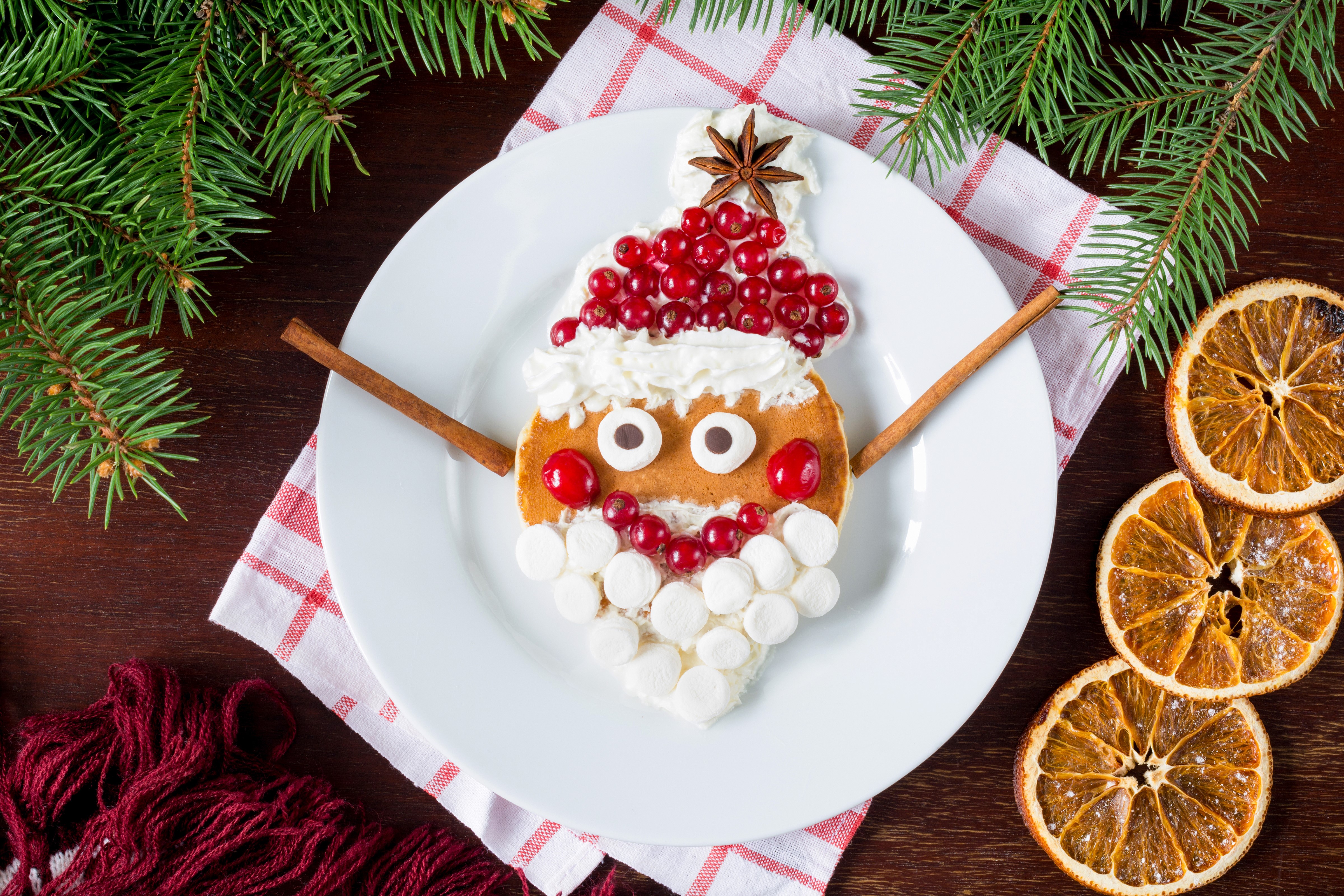 Santa Claus pancake design with cranberries and marshmallows HD Wallpaper