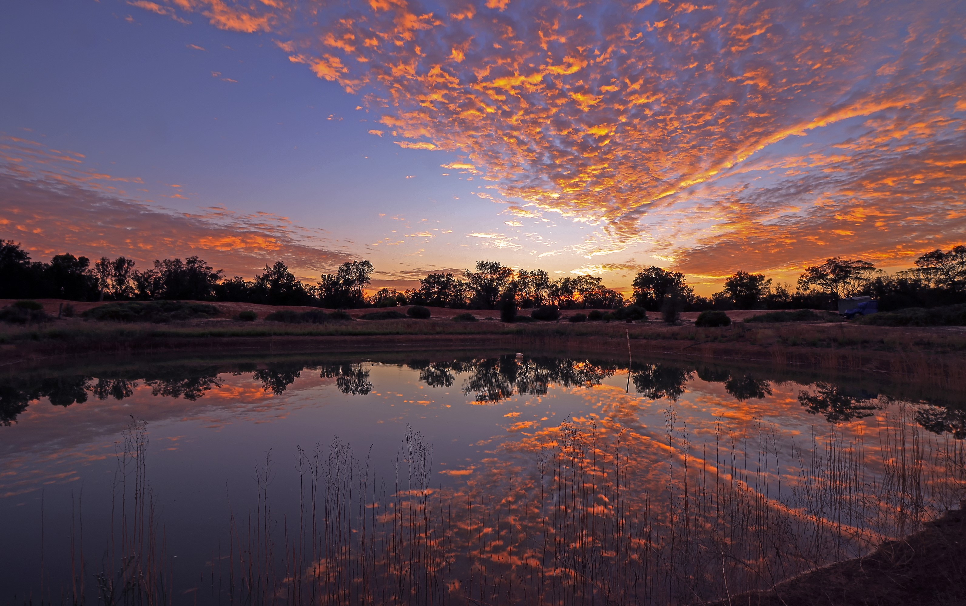 Sunset over Gluepot, Australia with lake reflection HD Wallpaper