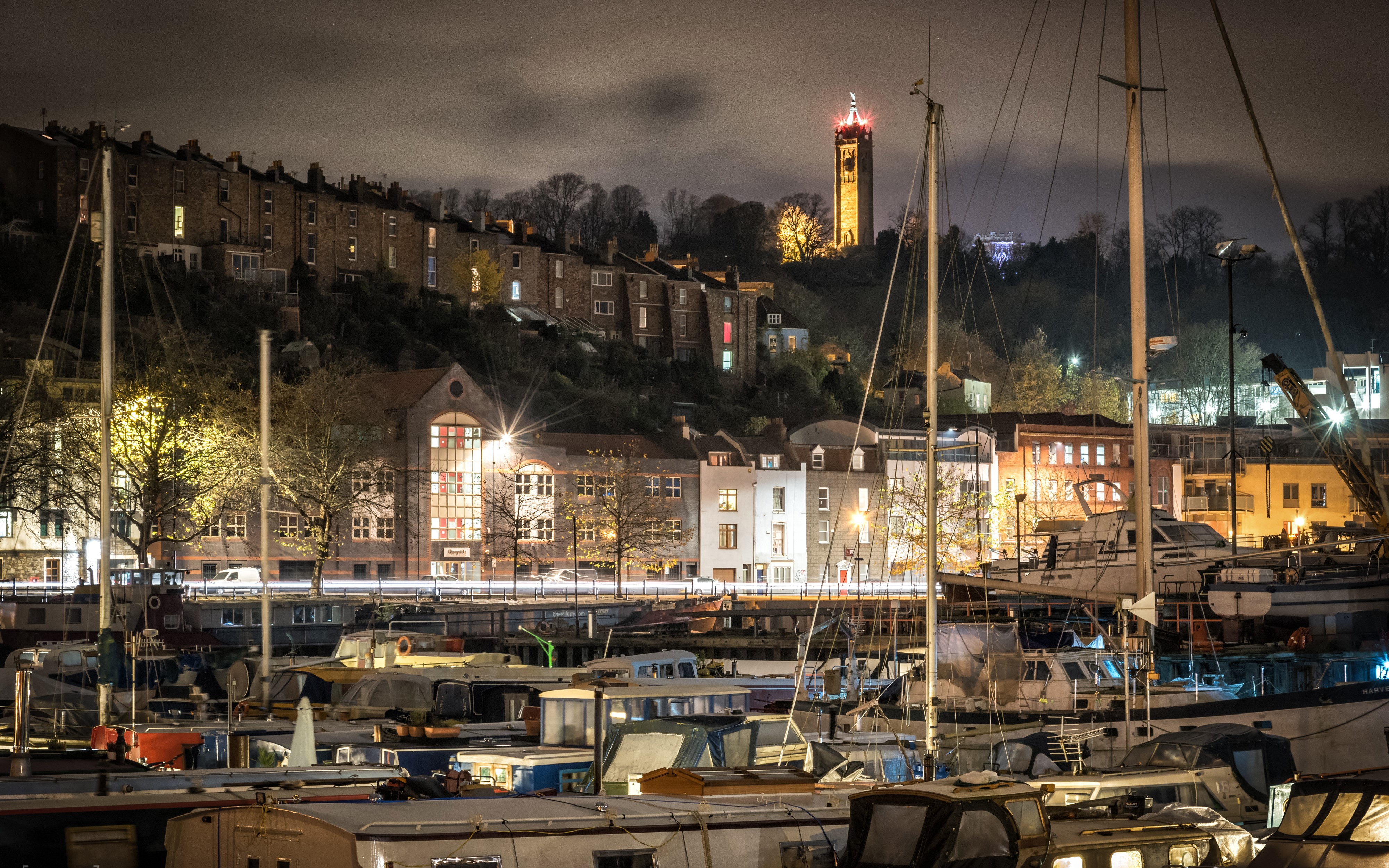 Night view of Bristol Marina with houses and tower HD Wallpaper