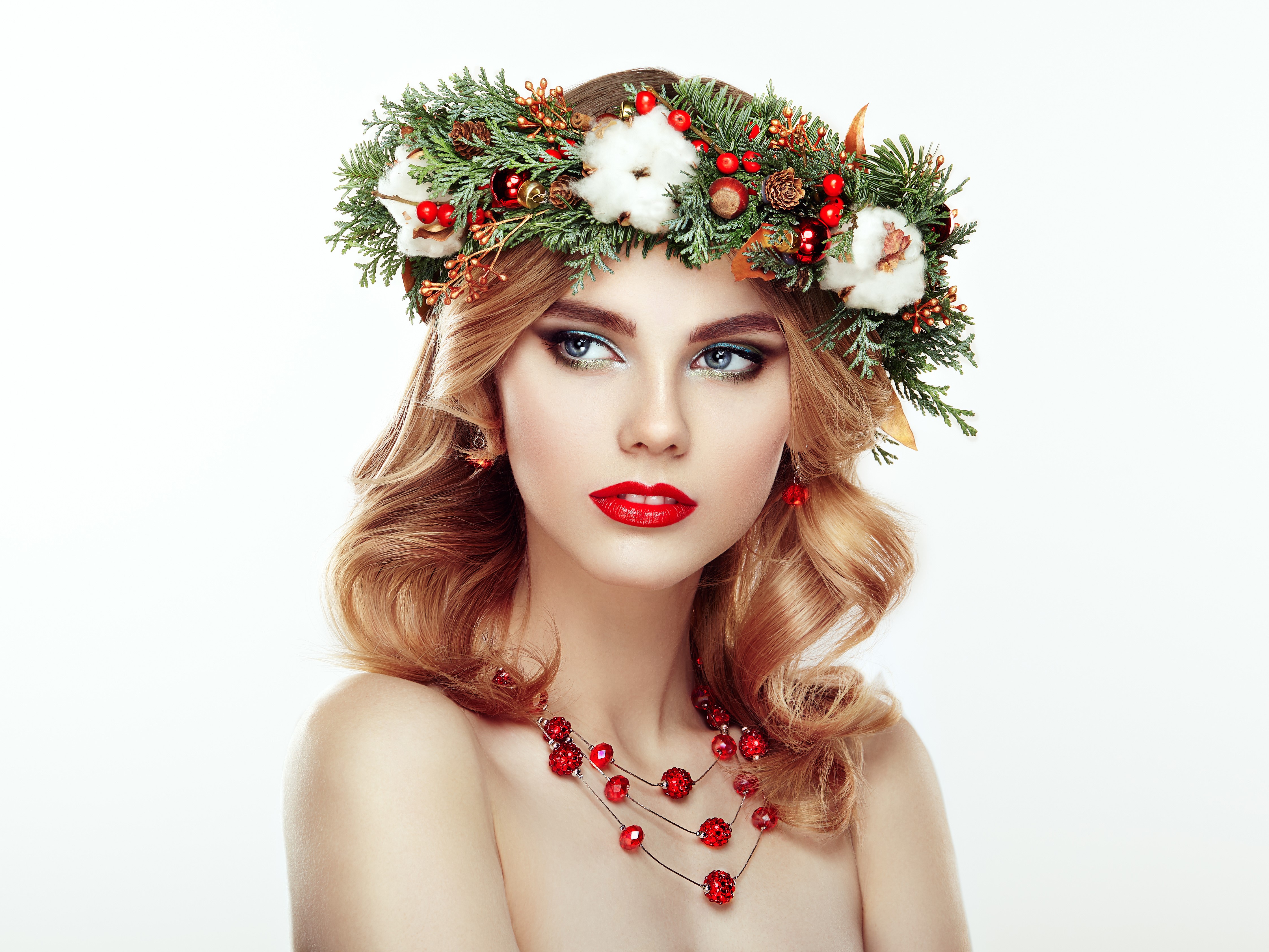 Woman with Christmas wreath and red necklace HD Wallpaper