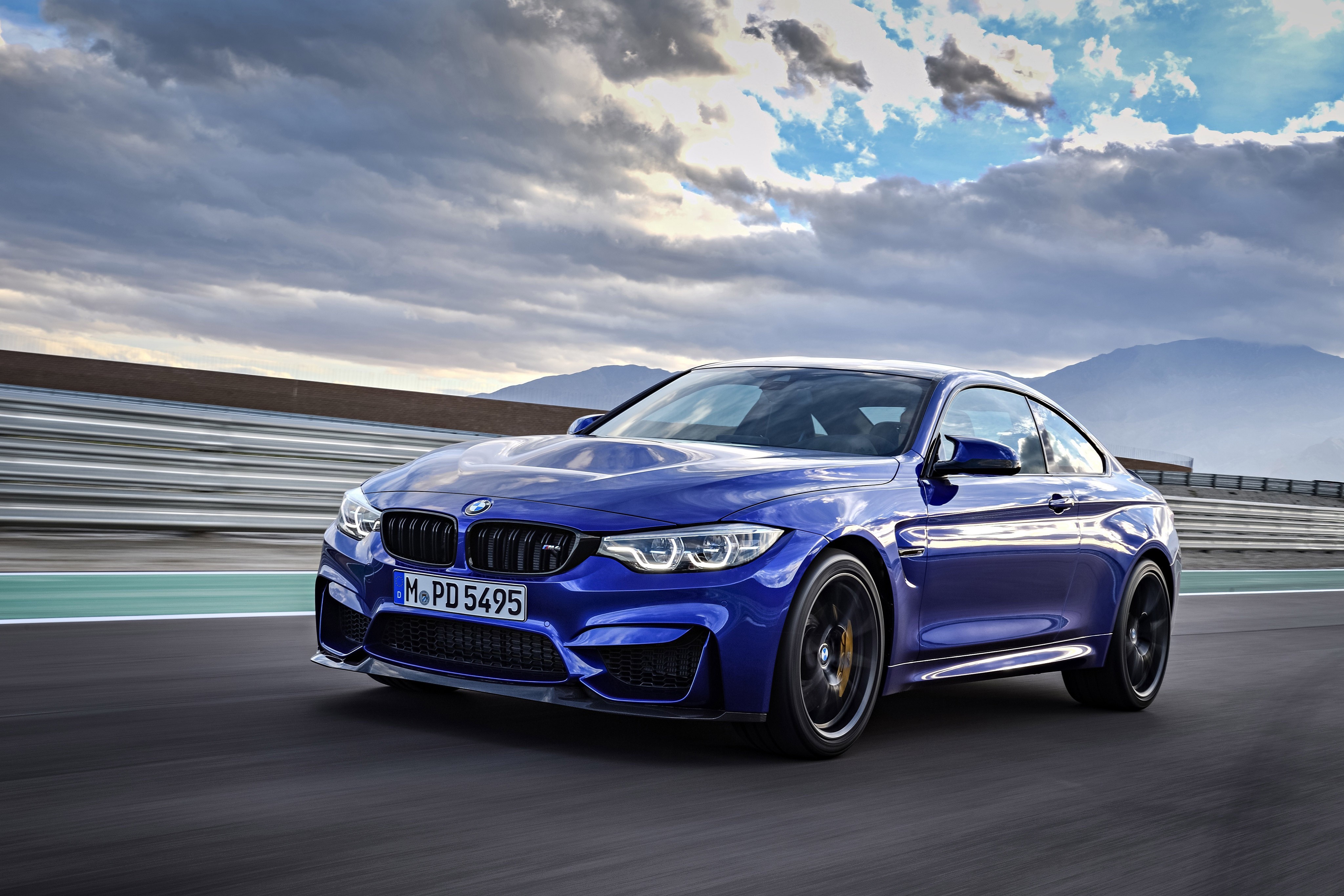 BMW M4 CS Coupe on a Racetrack HD Wallpaper