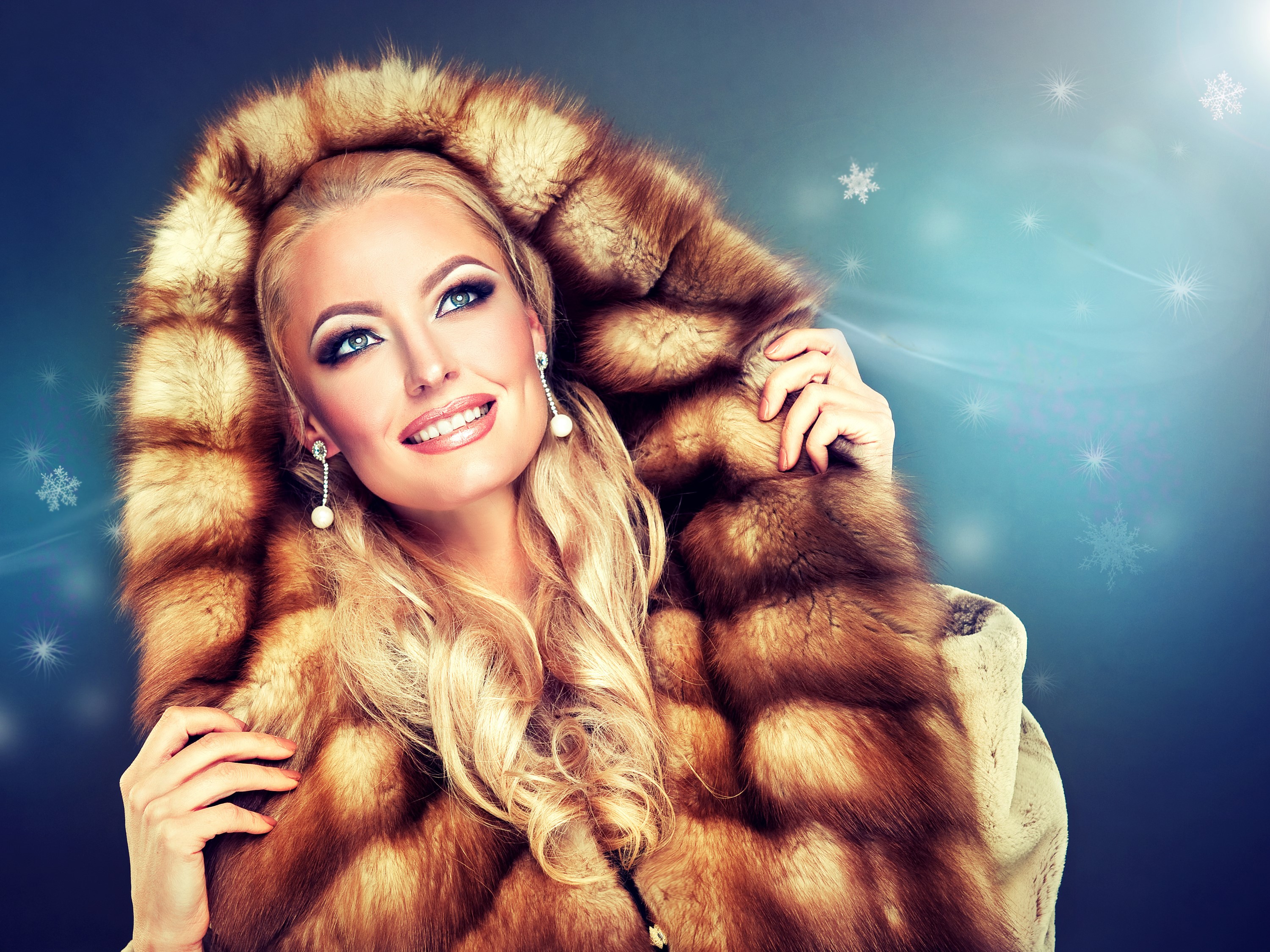 Blonde woman in fur coat with snowflakes HD Wallpaper