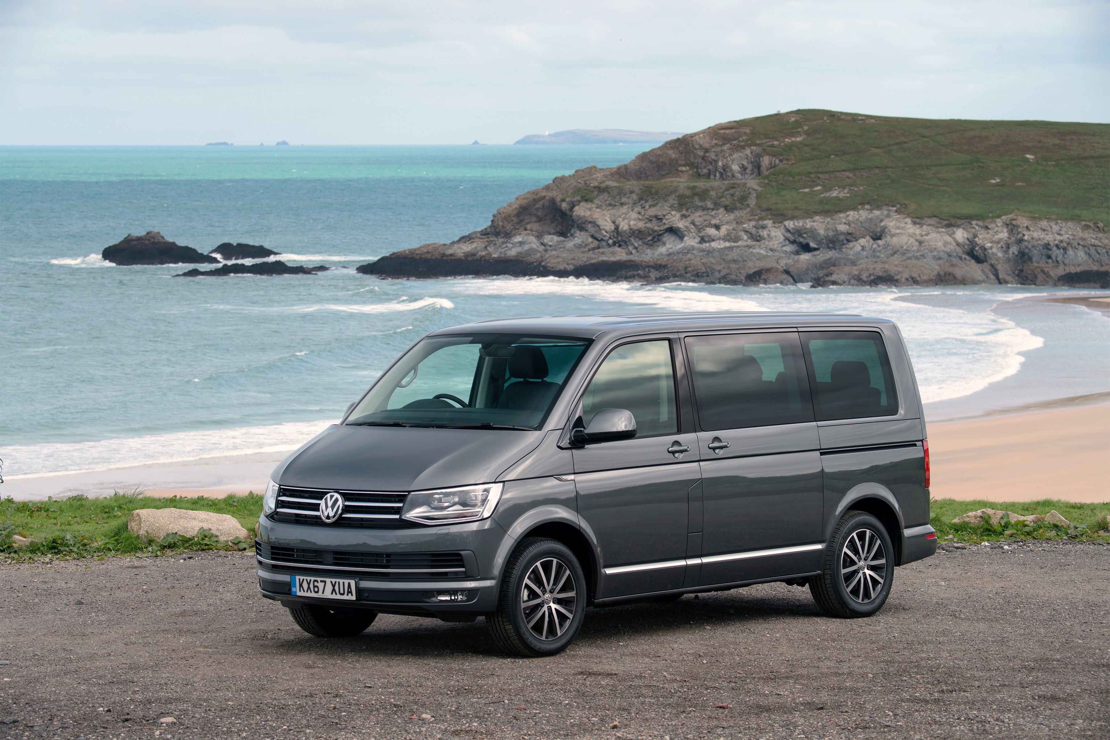 Grey Volkswagen Caravelle parked by the sea HD Wallpaper