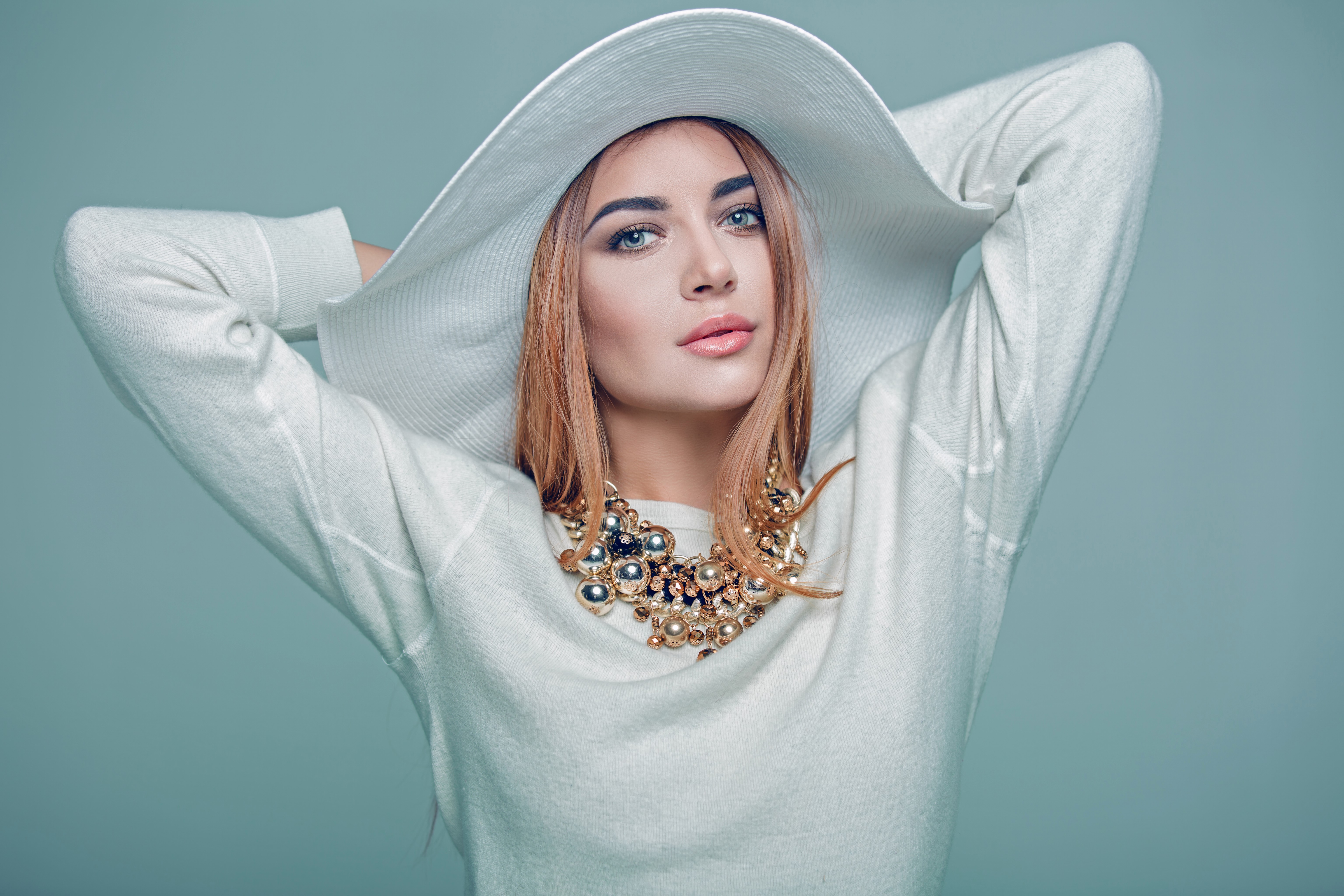 Woman in white hat and sweater with necklace HD Wallpaper