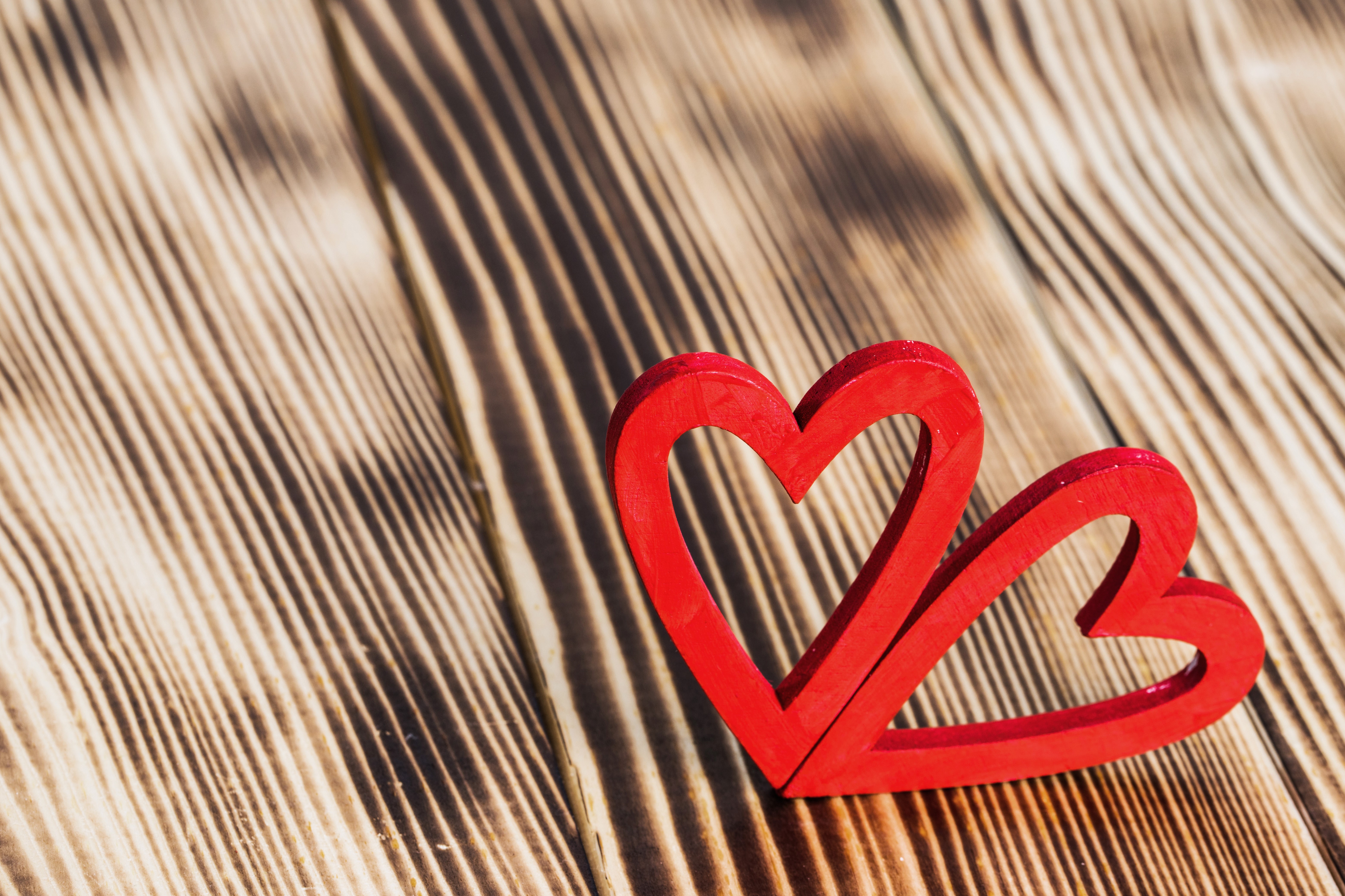 Two red hearts on wood planks HD Wallpaper