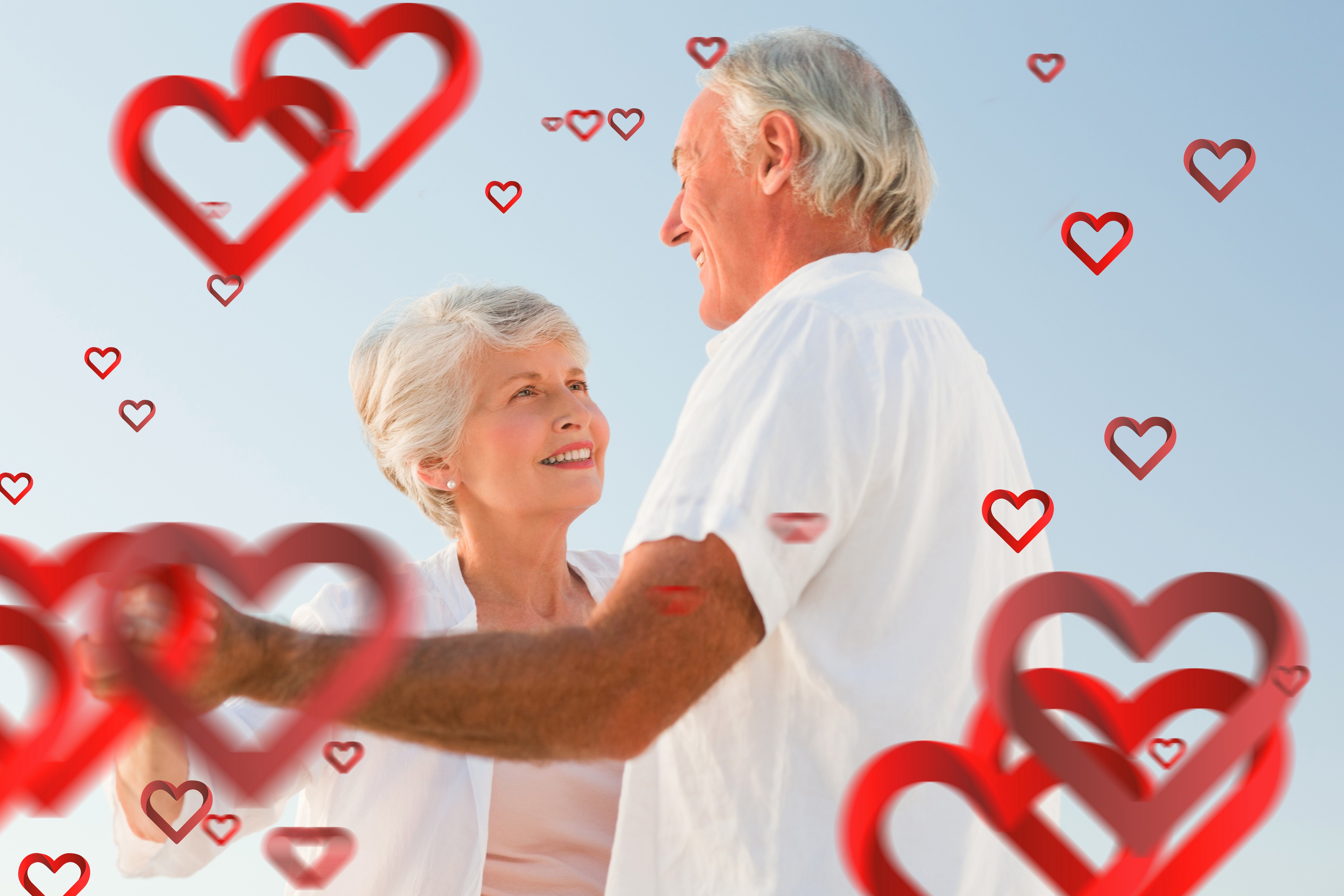 Elderly couple dancing with hearts HD Wallpaper
