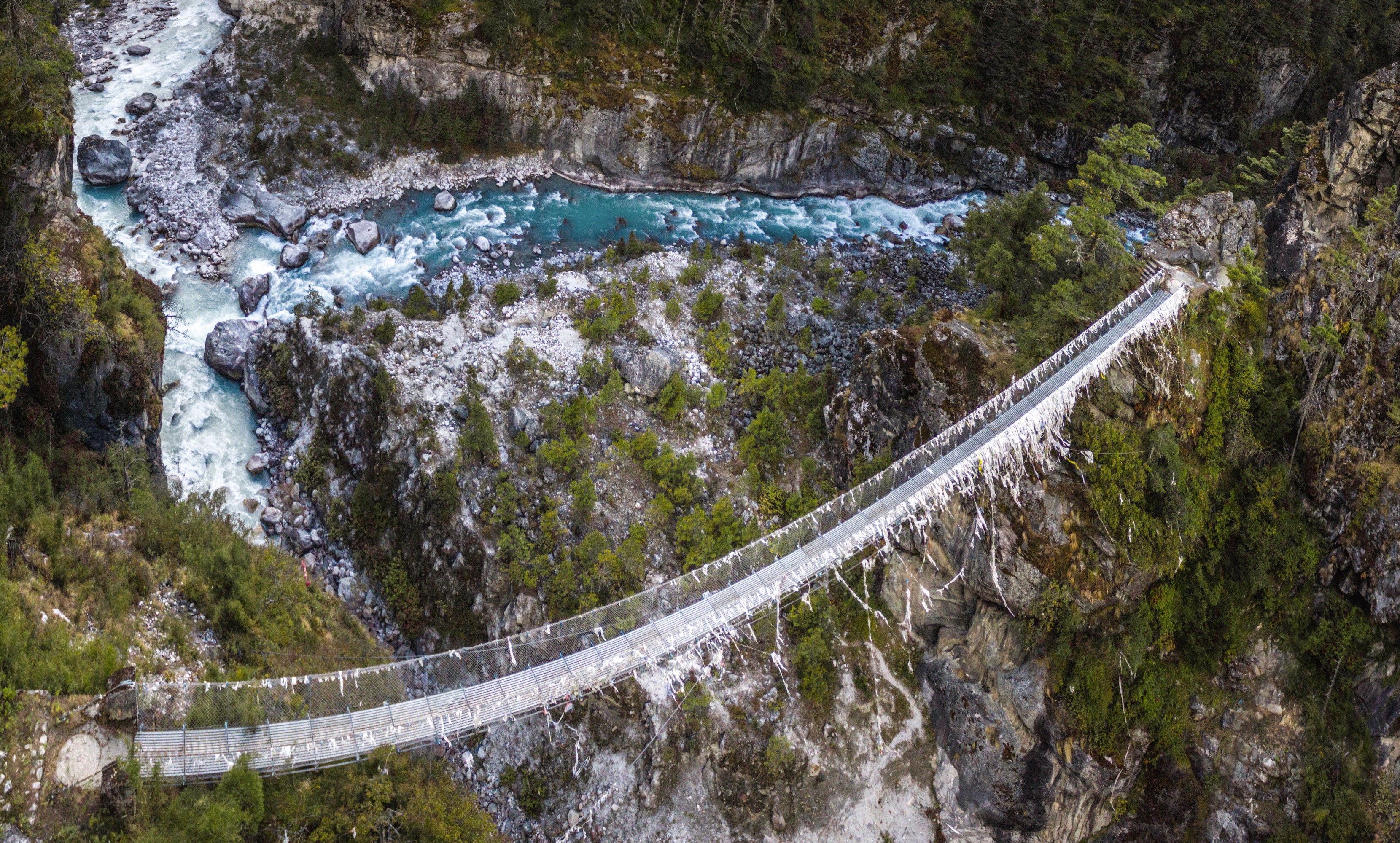 Suspension bridge over a river in Nepal HD Wallpaper