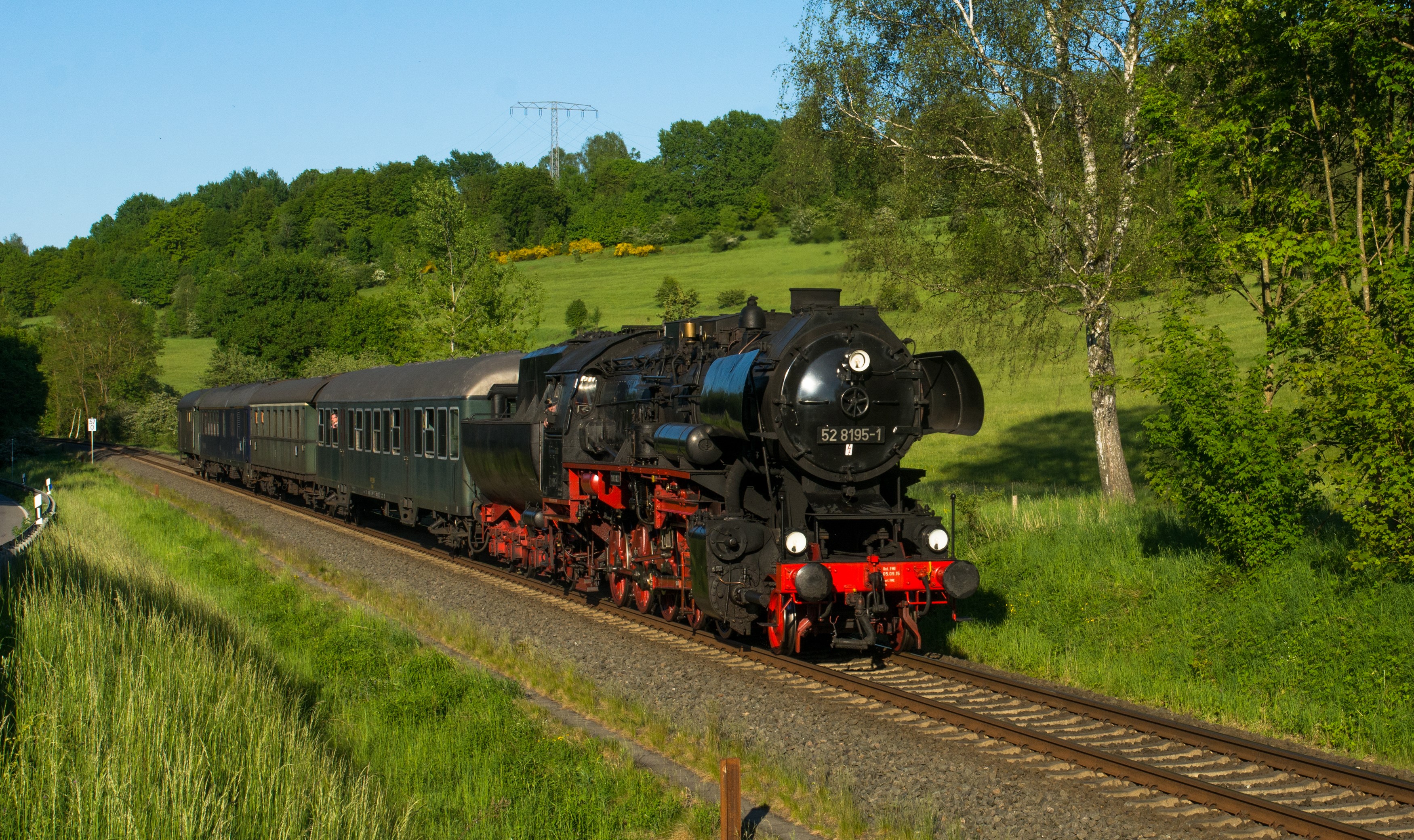 Steam Locomotive and Passenger Cars on Railroad Tracks HD Wallpaper