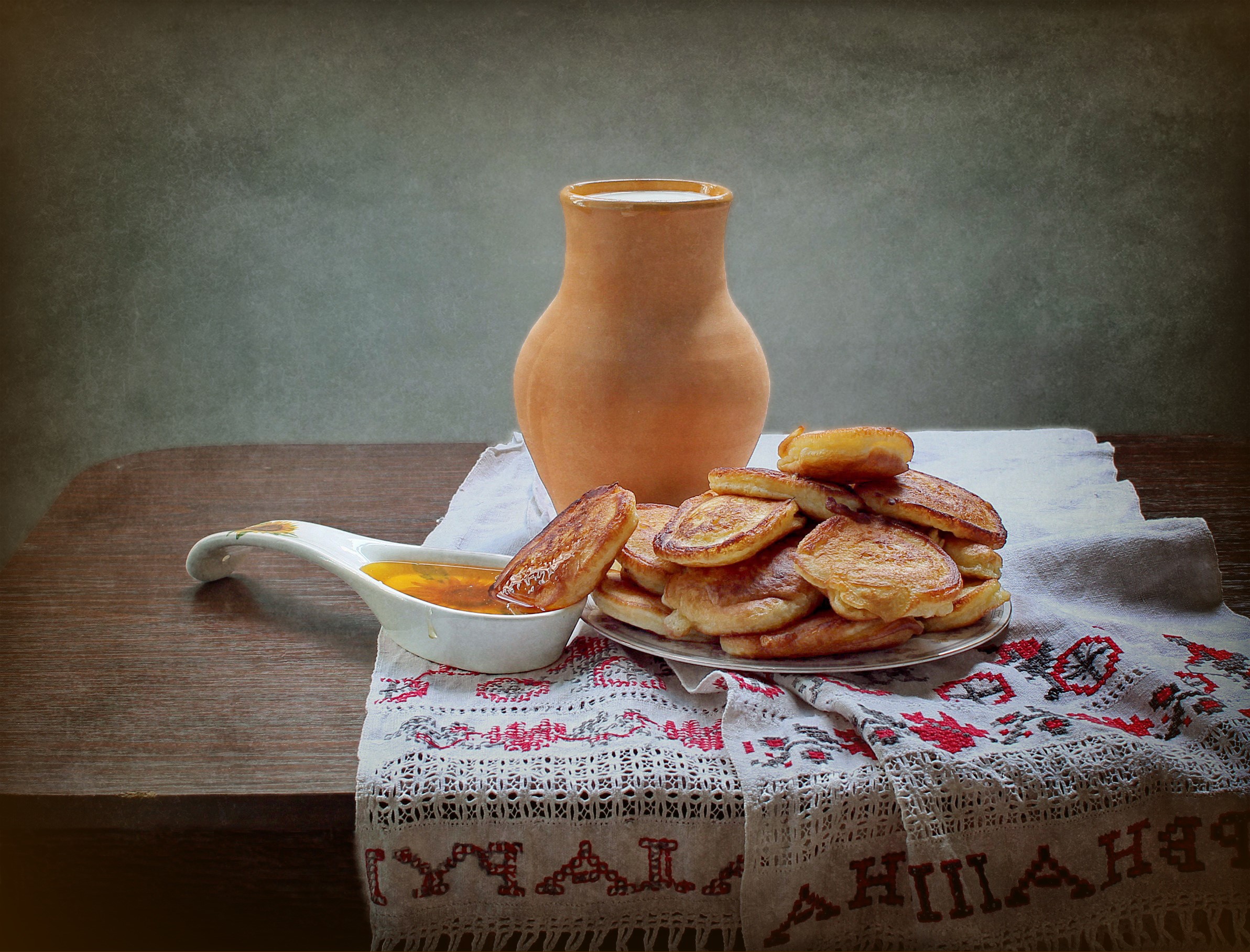 Pancakes with honey and a jug of milk on a table HD Wallpaper