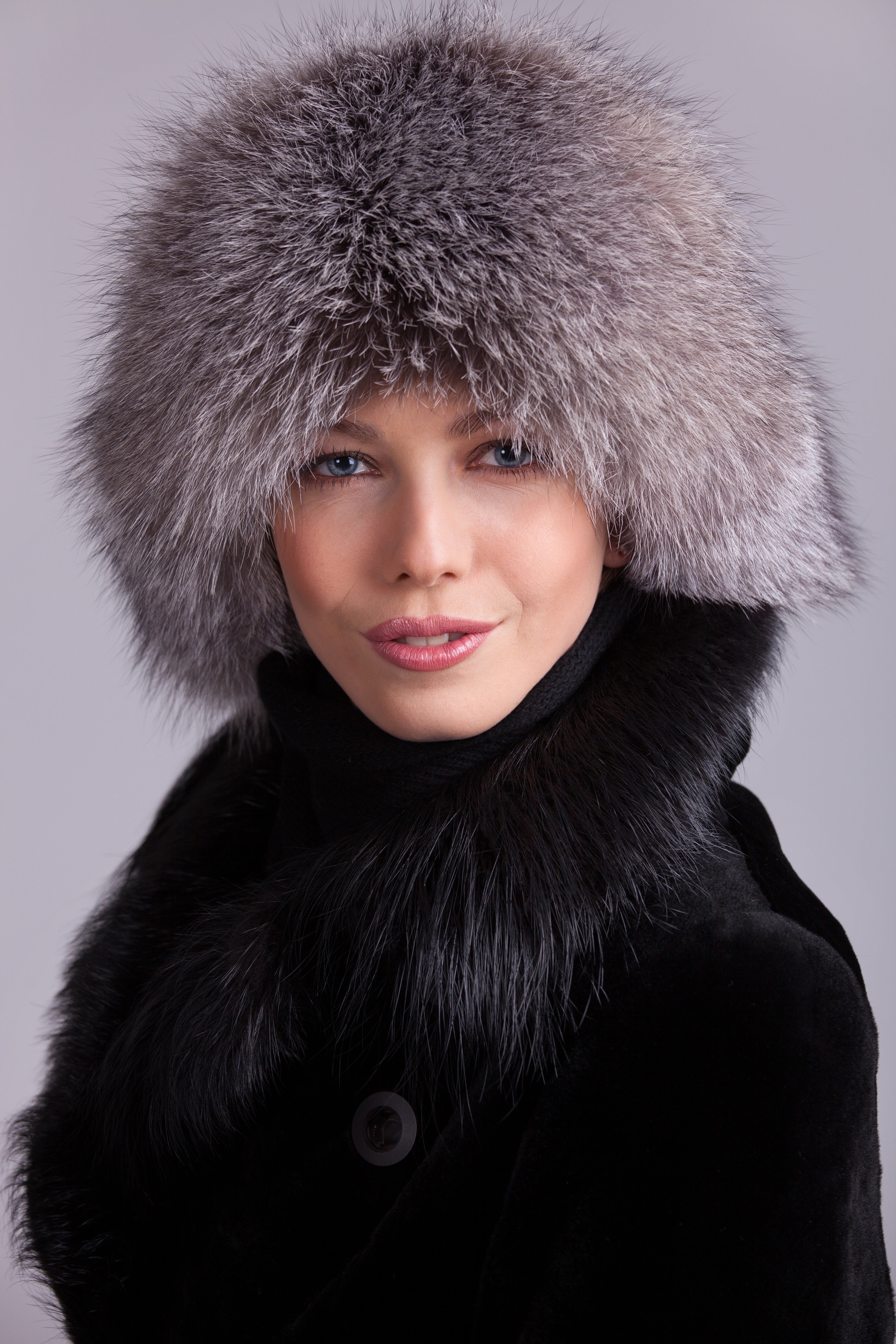 Woman in a fur hat and coat HD Phone Wallpaper