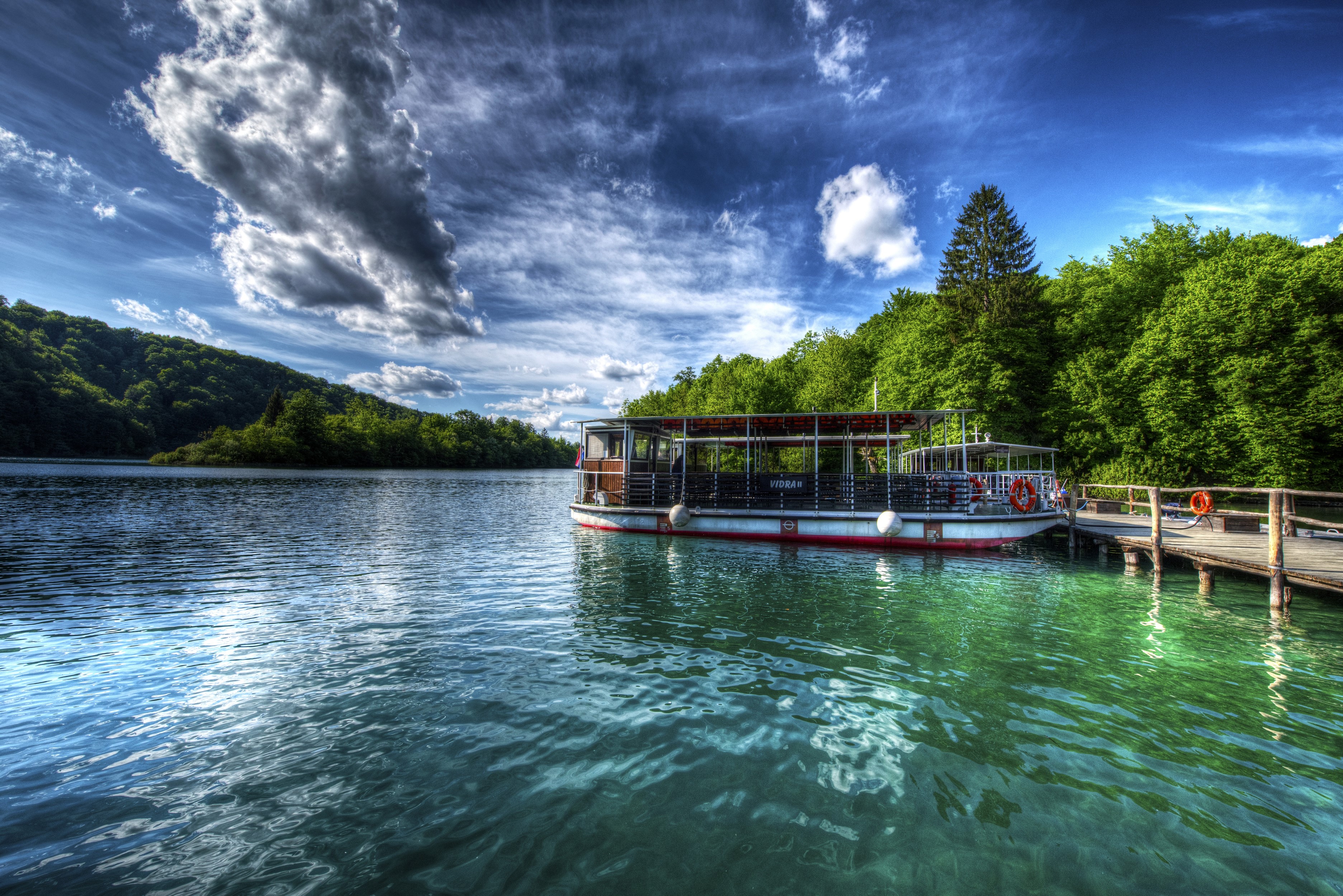 Boat on a lake in Plitvice Lakes National Park, Croatia HD Wallpaper