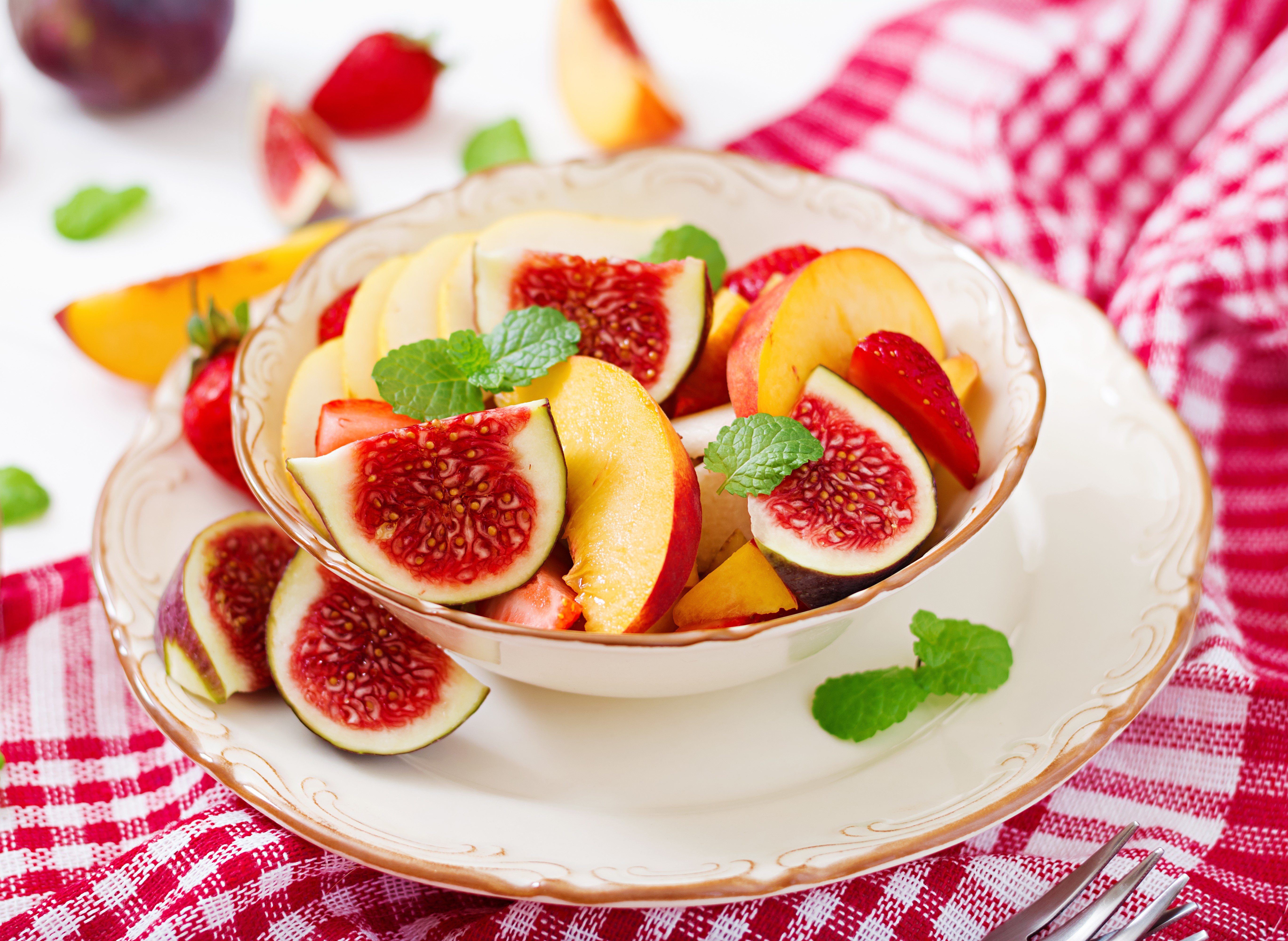 Fruit salad with figs, peaches, and strawberries HD Wallpaper
