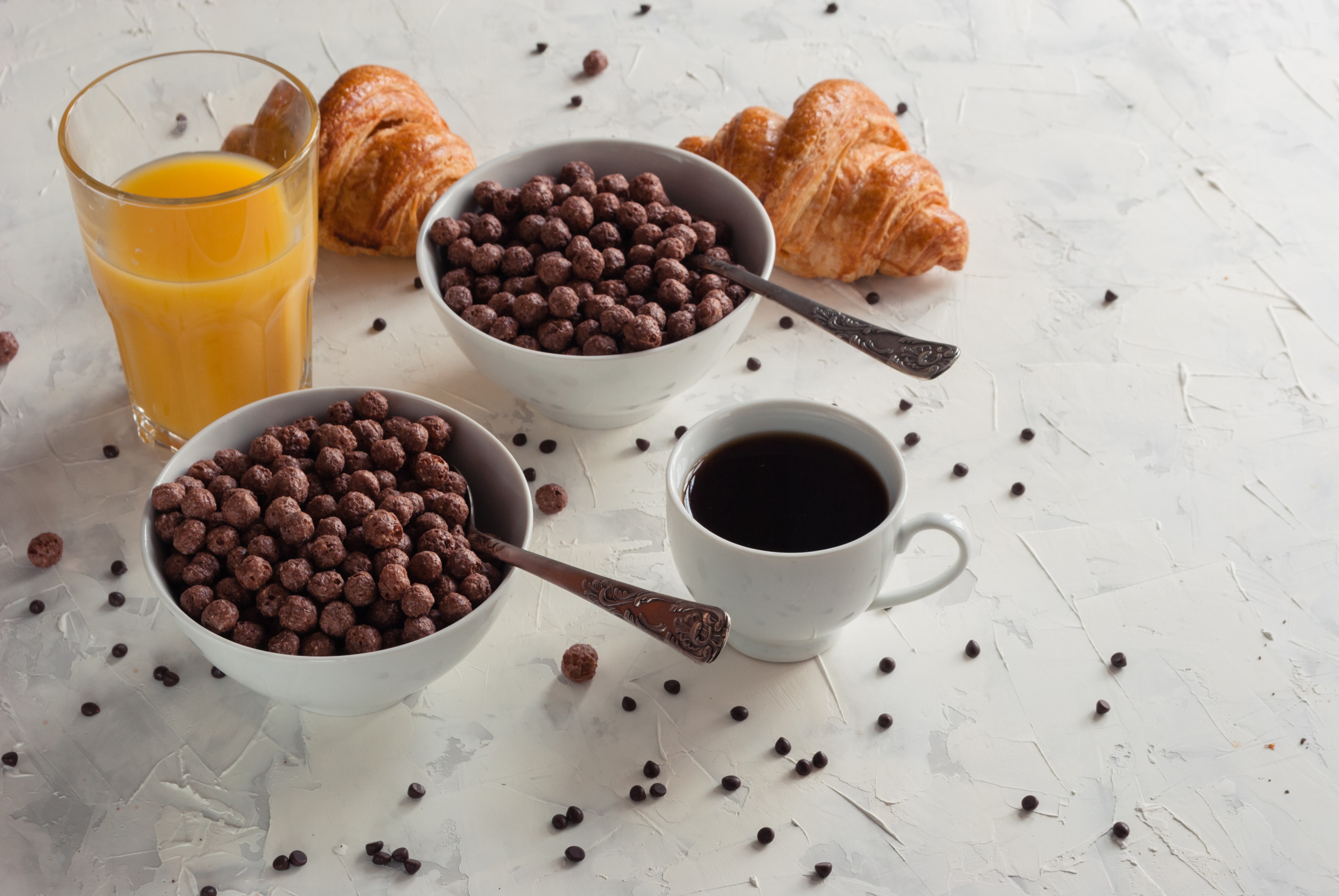 Breakfast with coffee, juice, croissants, and cereal HD Wallpaper