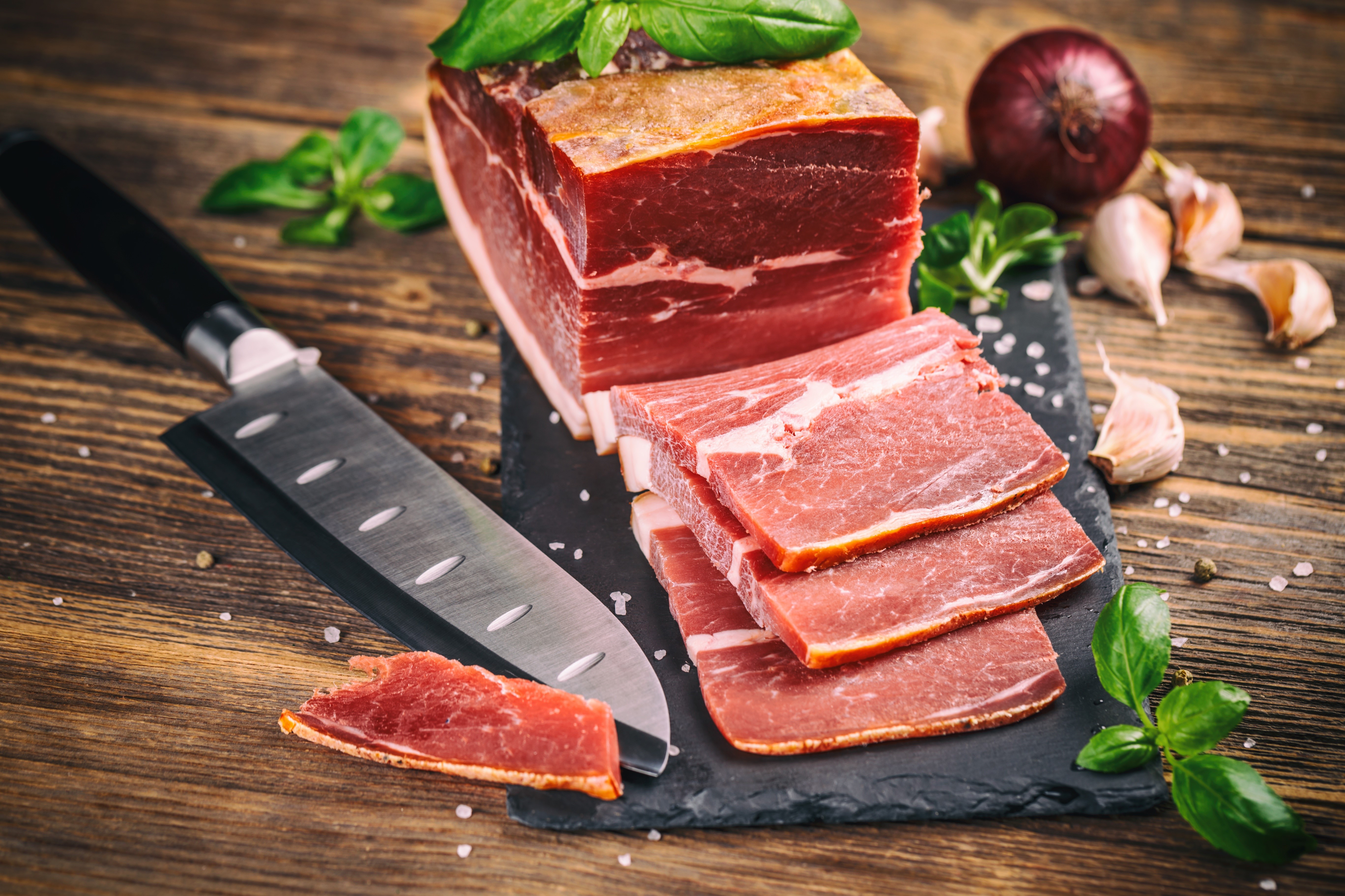 Meat products with knife and vegetables HD Wallpaper