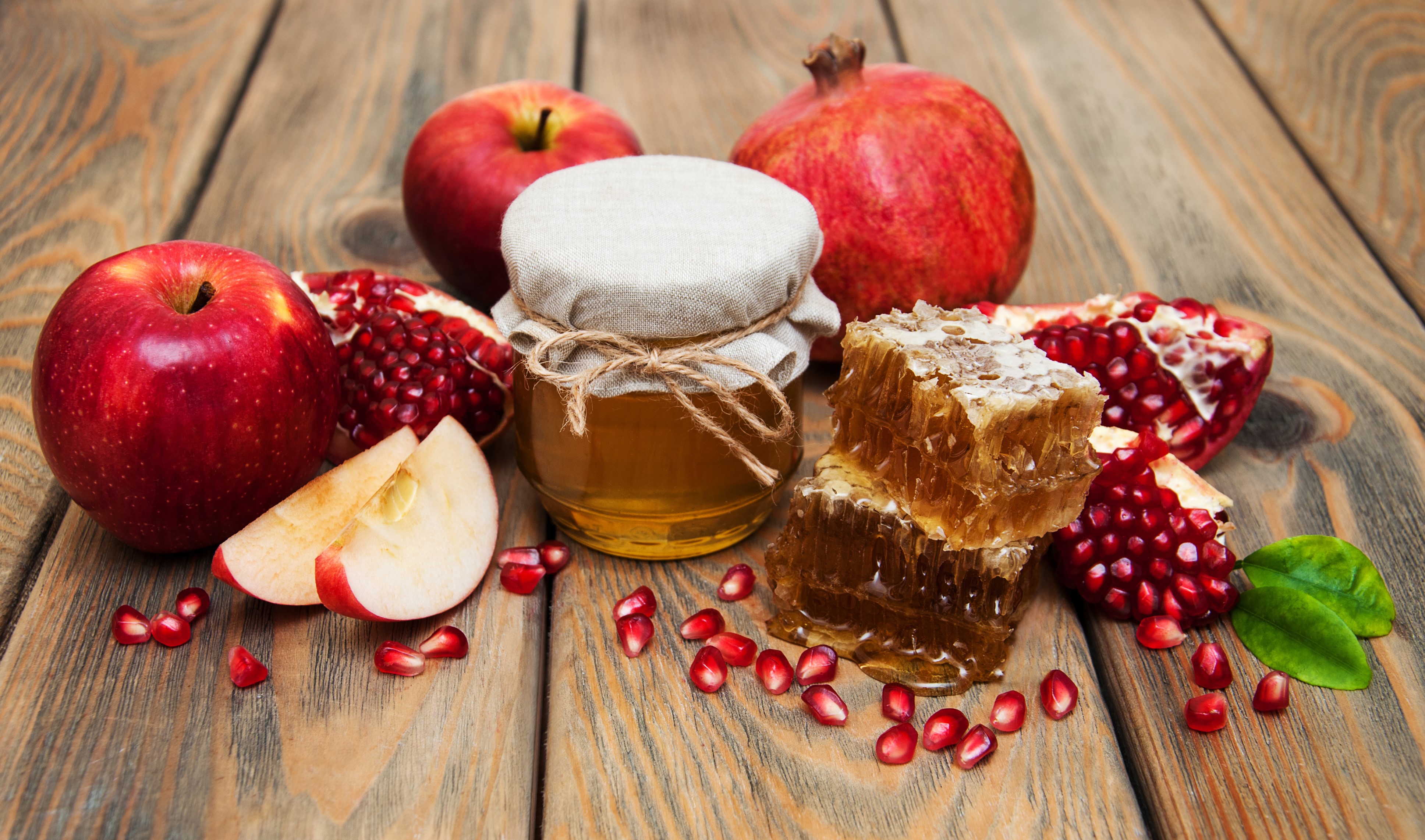 Honey, Apples, and Pomegranates on Wood HD Wallpaper