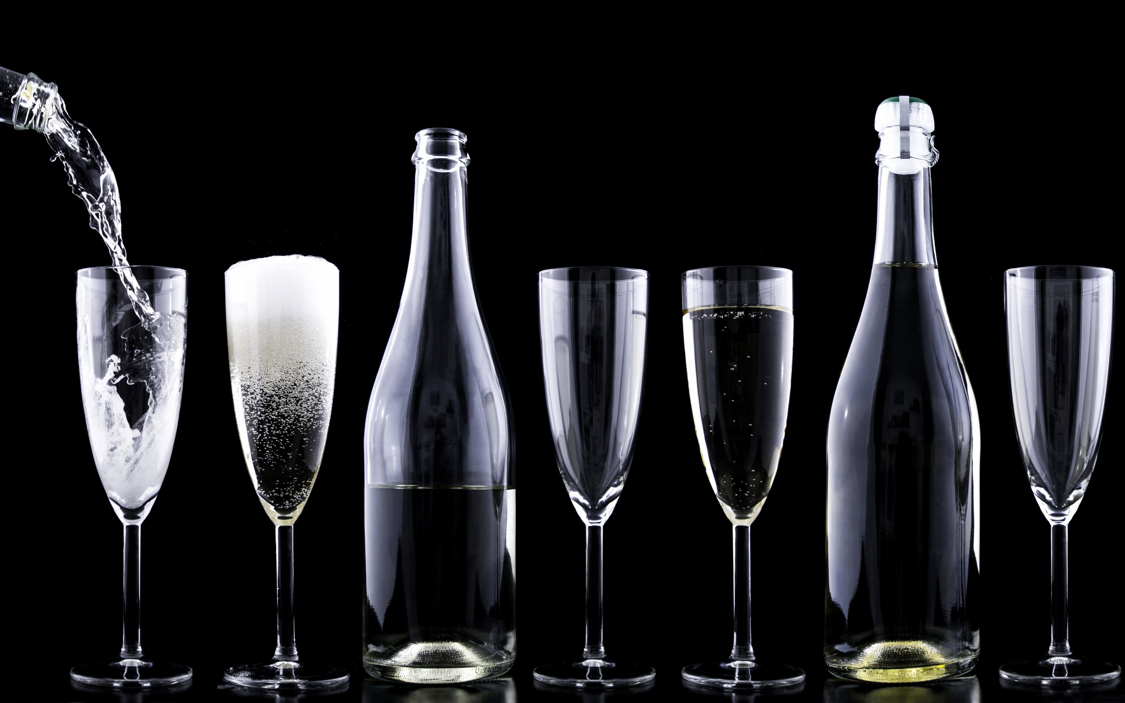 Champagne bottles and glasses on black background HD Wallpaper