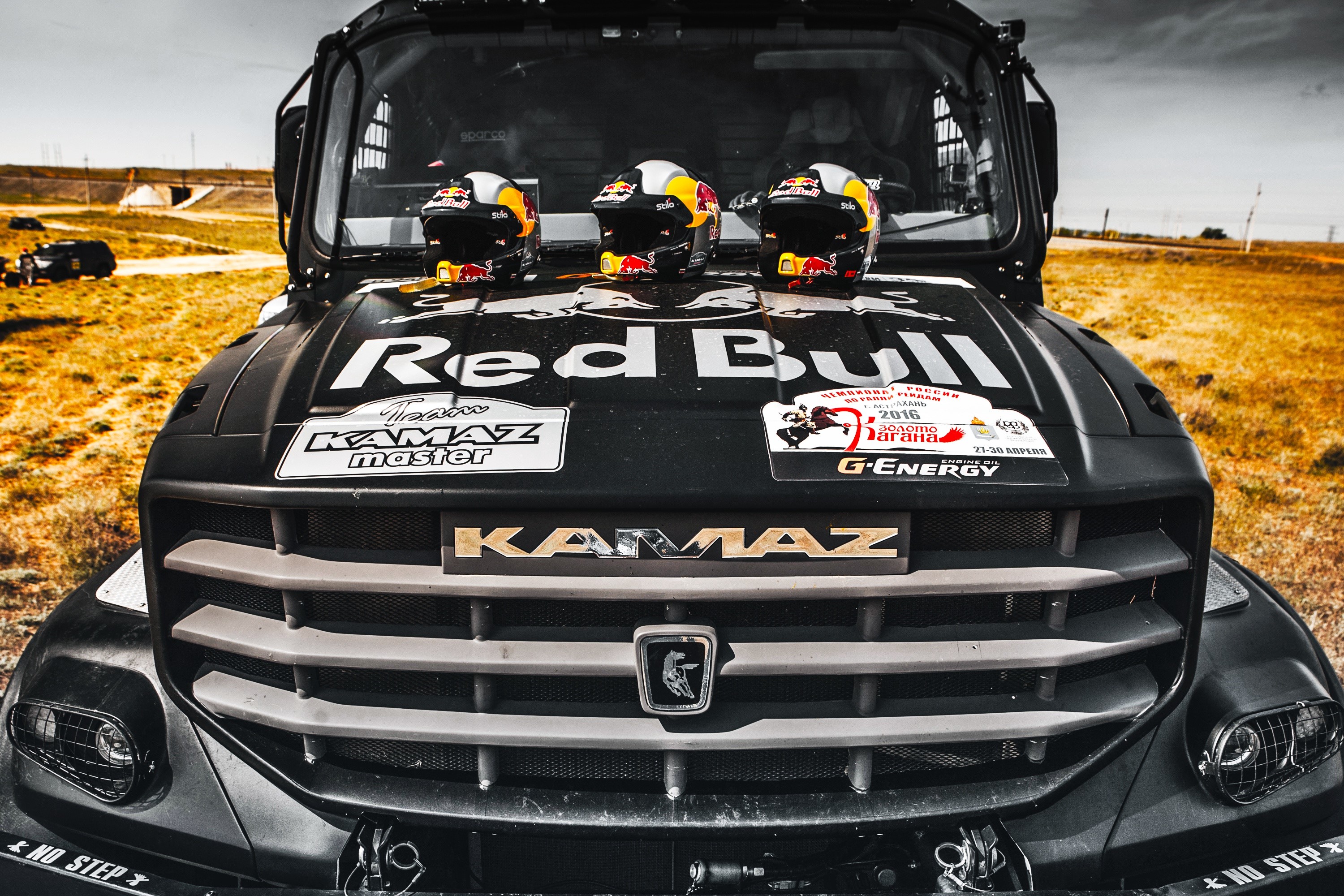 KAMAZ truck with Red Bull helmets HD Wallpaper