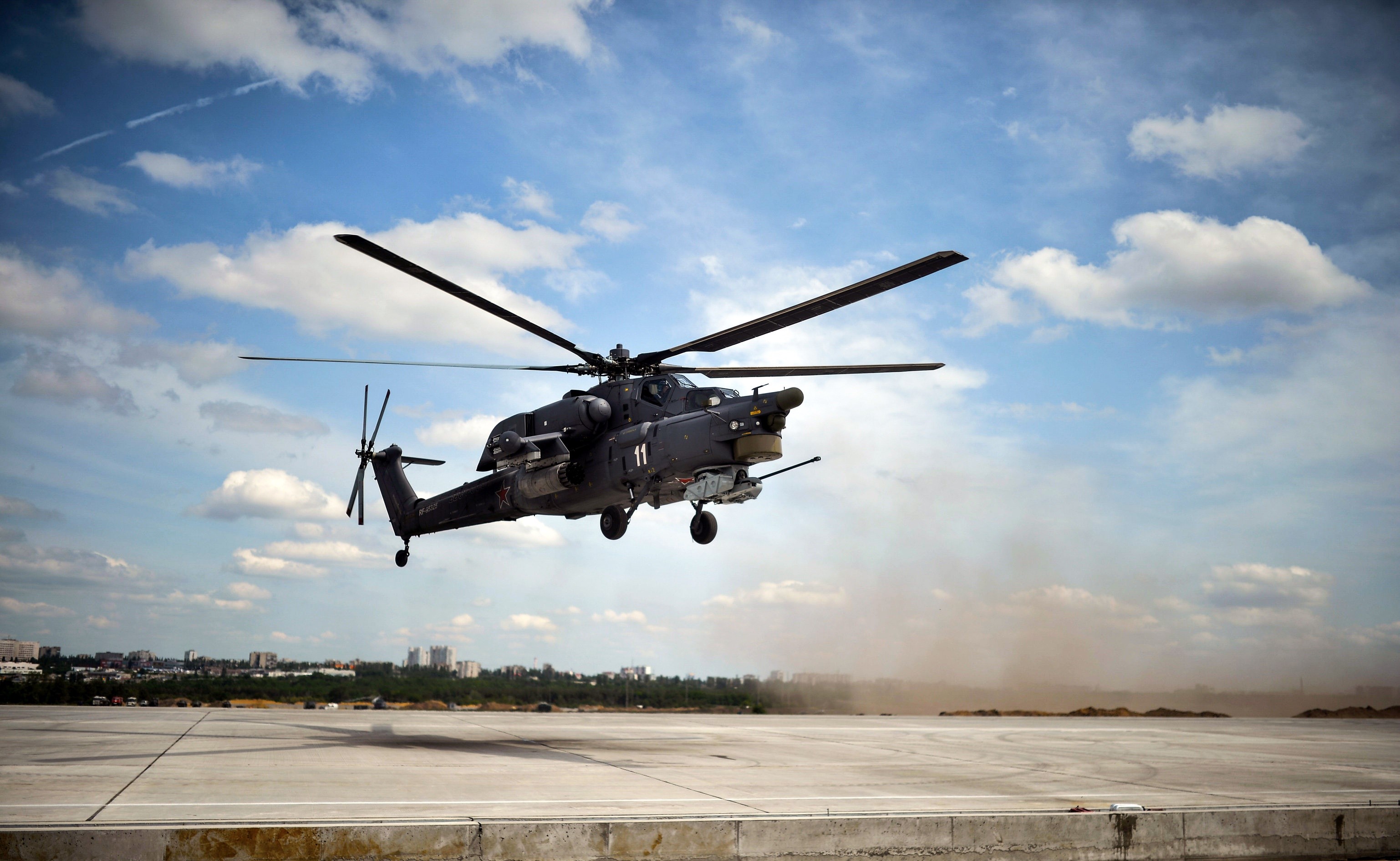 Mi-28N helicopter taking off from a helipad HD Wallpaper