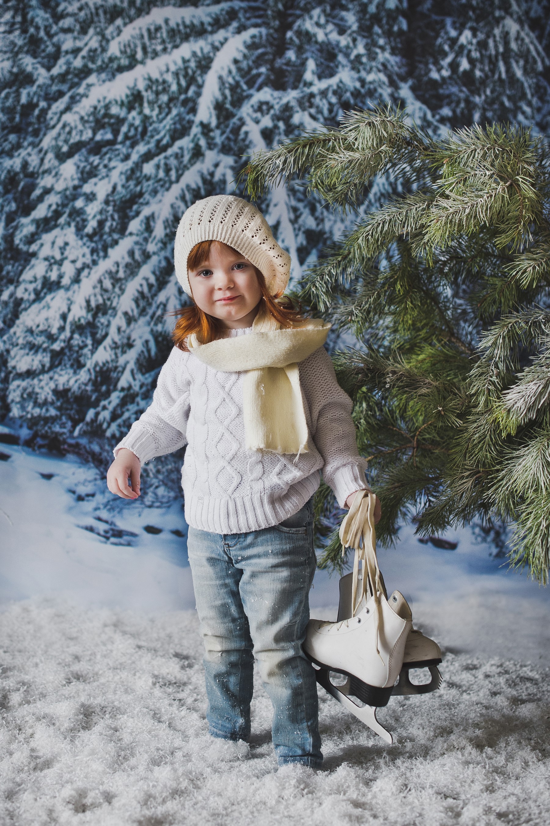 Girl in winter clothes holding ice skates HD Phone Wallpaper
