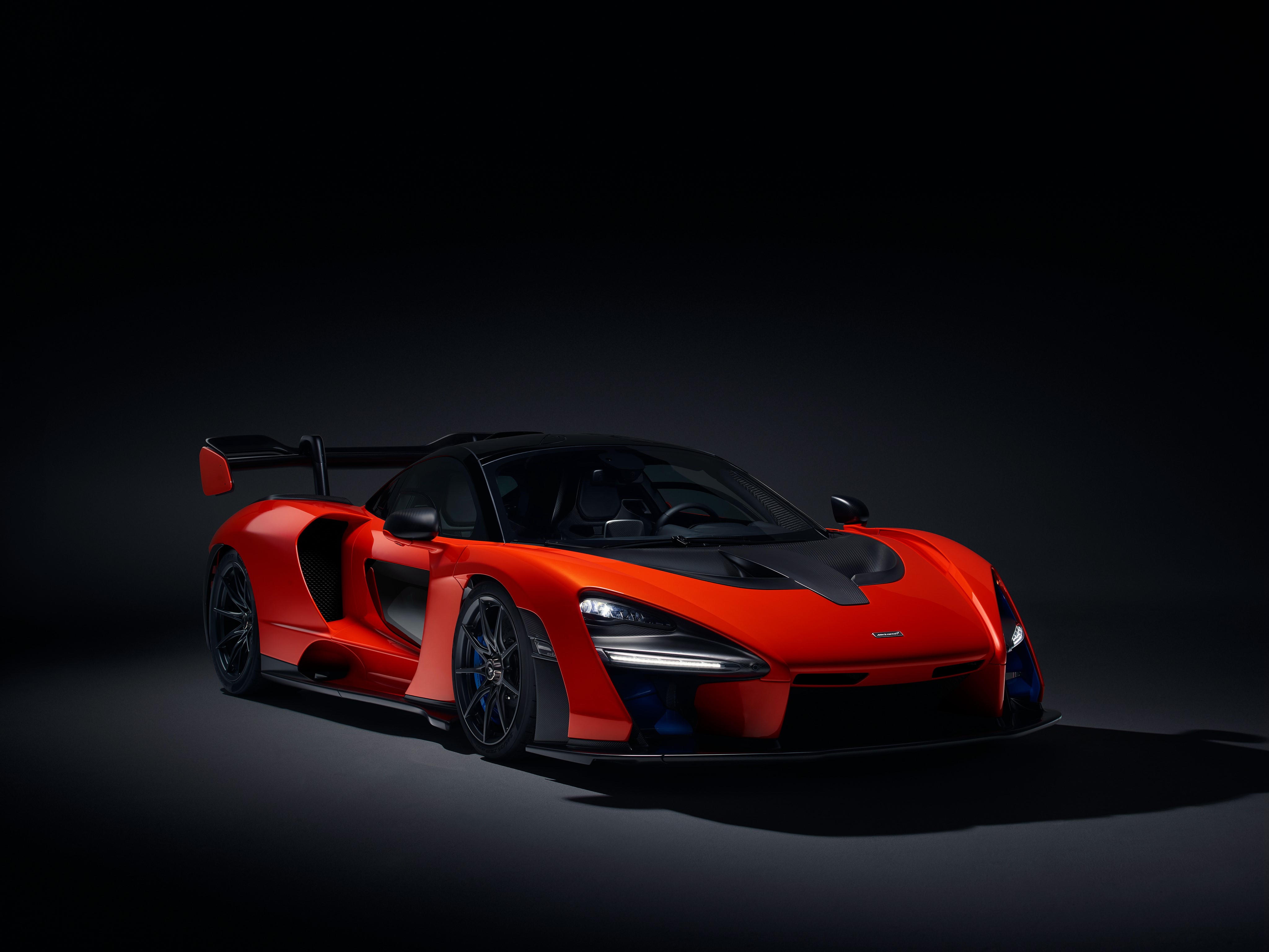McLaren Senna sports car on black background HD Wallpaper