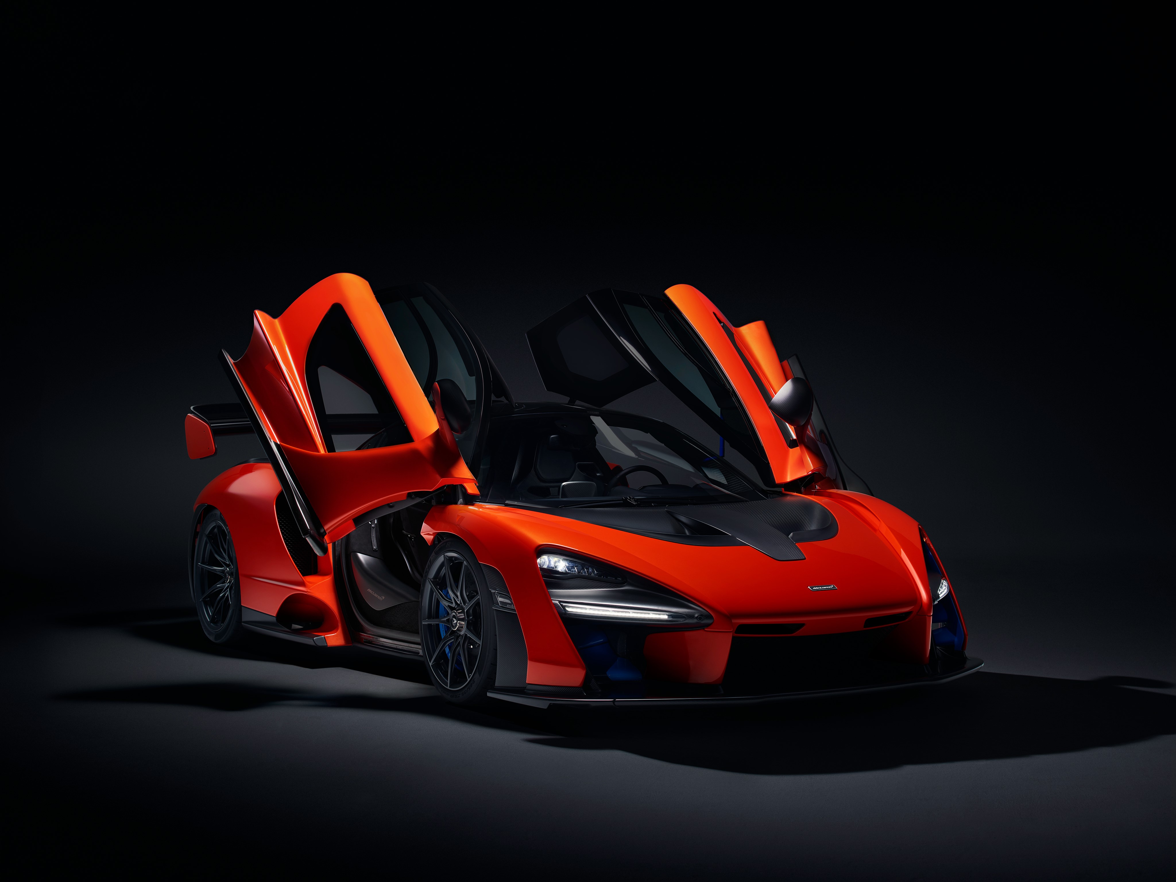 McLaren Senna with opened doors on black background HD Wallpaper