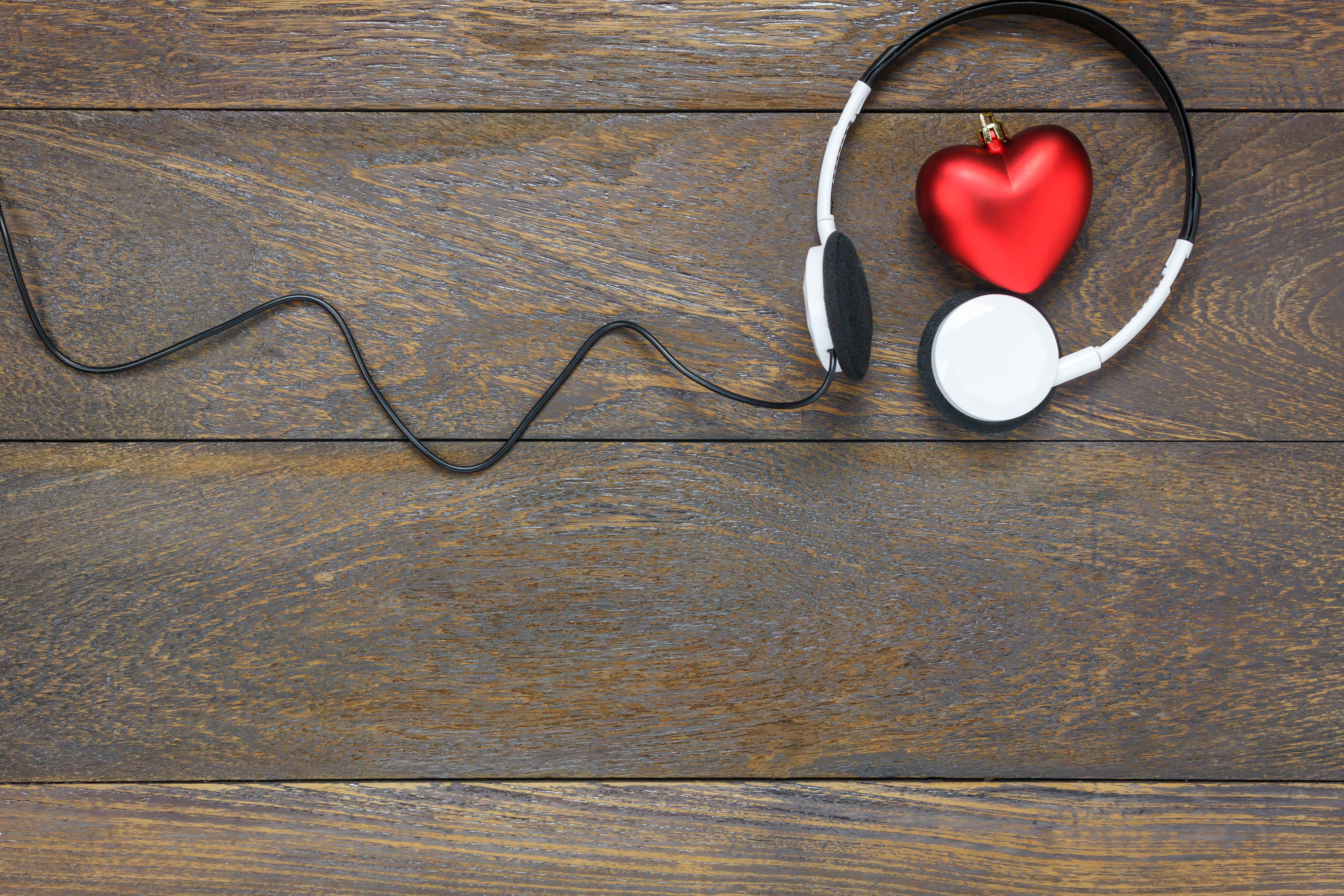 Headphones and red heart on wood planks HD Wallpaper