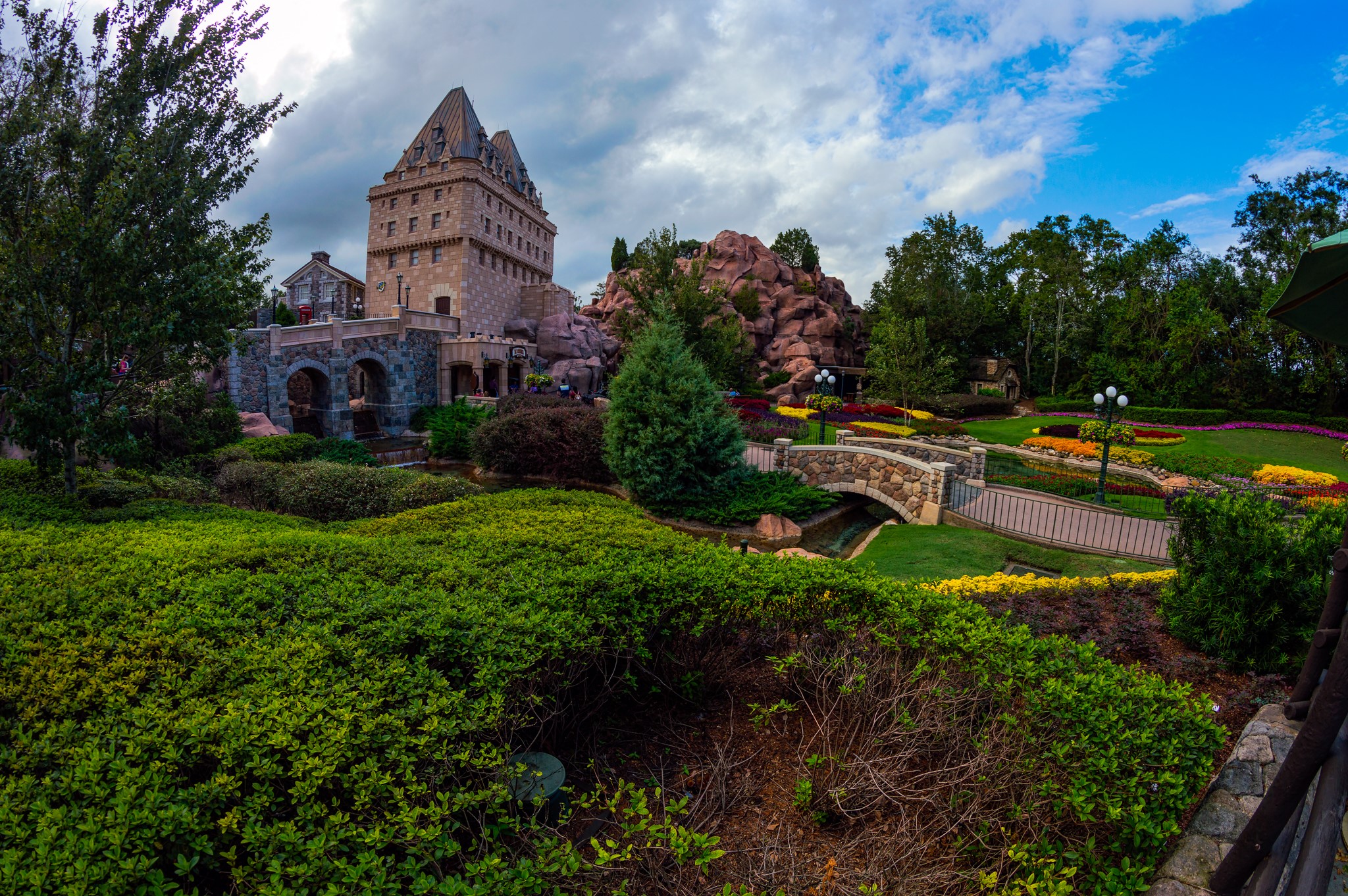 Disney World Epcot Canada Pavilion with gardens and bridge HD Wallpaper