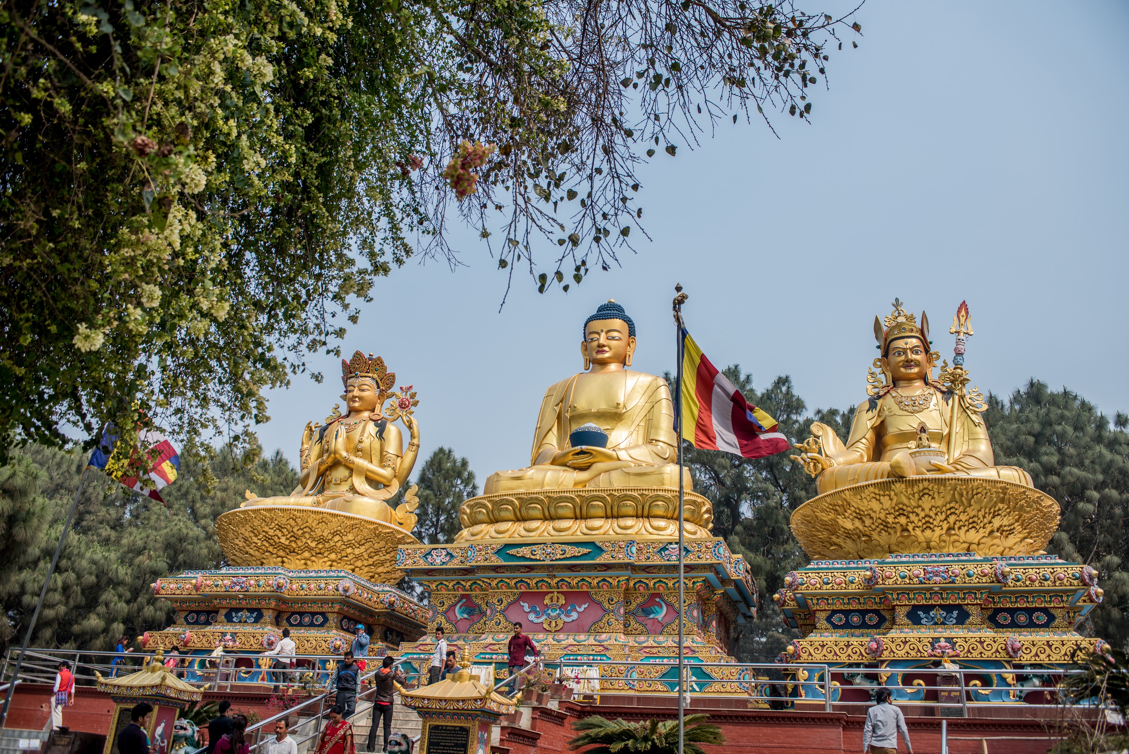 Three Golden Buddha Statues at Swayambhunath Nepal HD Wallpaper