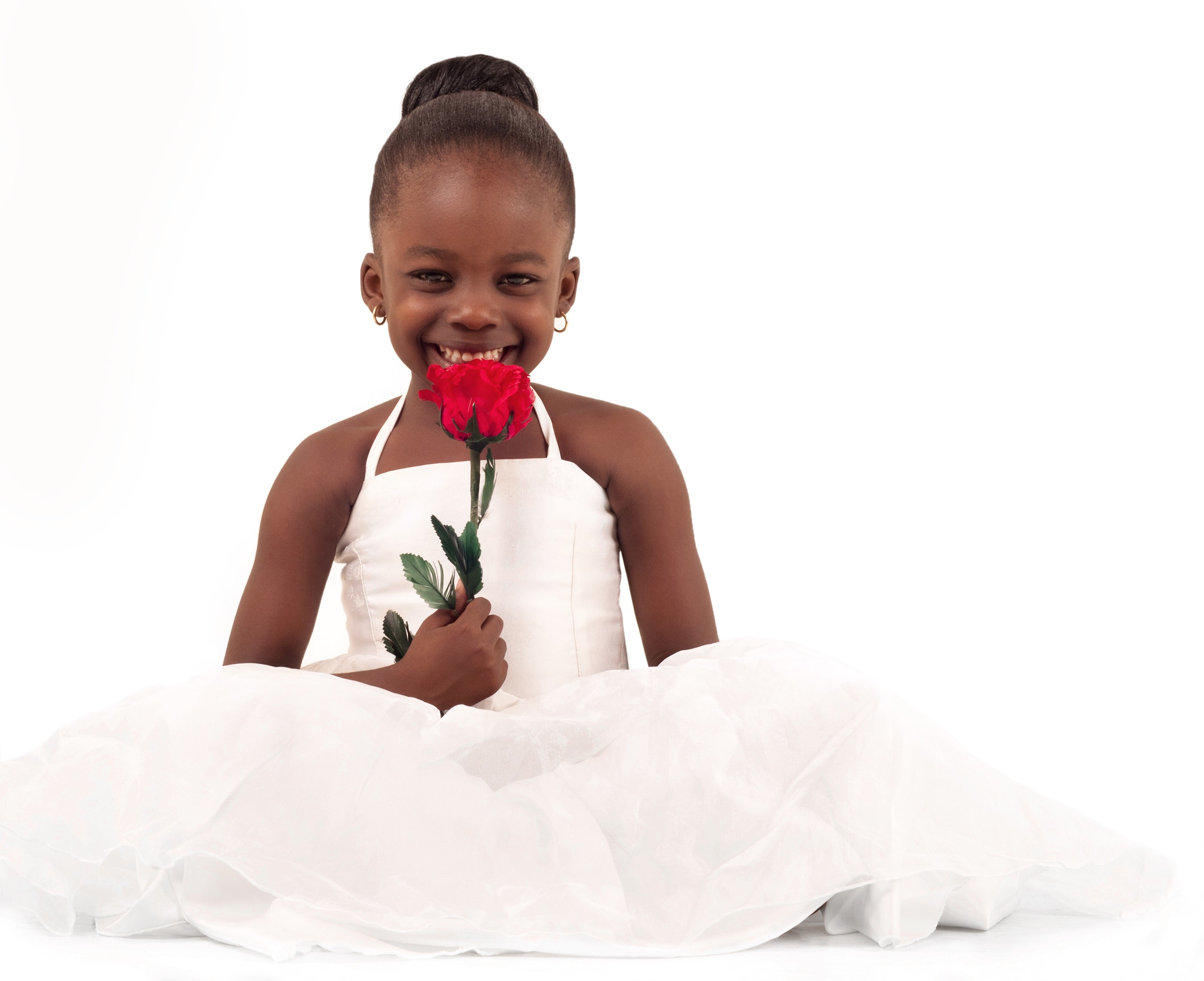 Young Black Girl in White Dress Holding a Red Rose HD Wallpaper