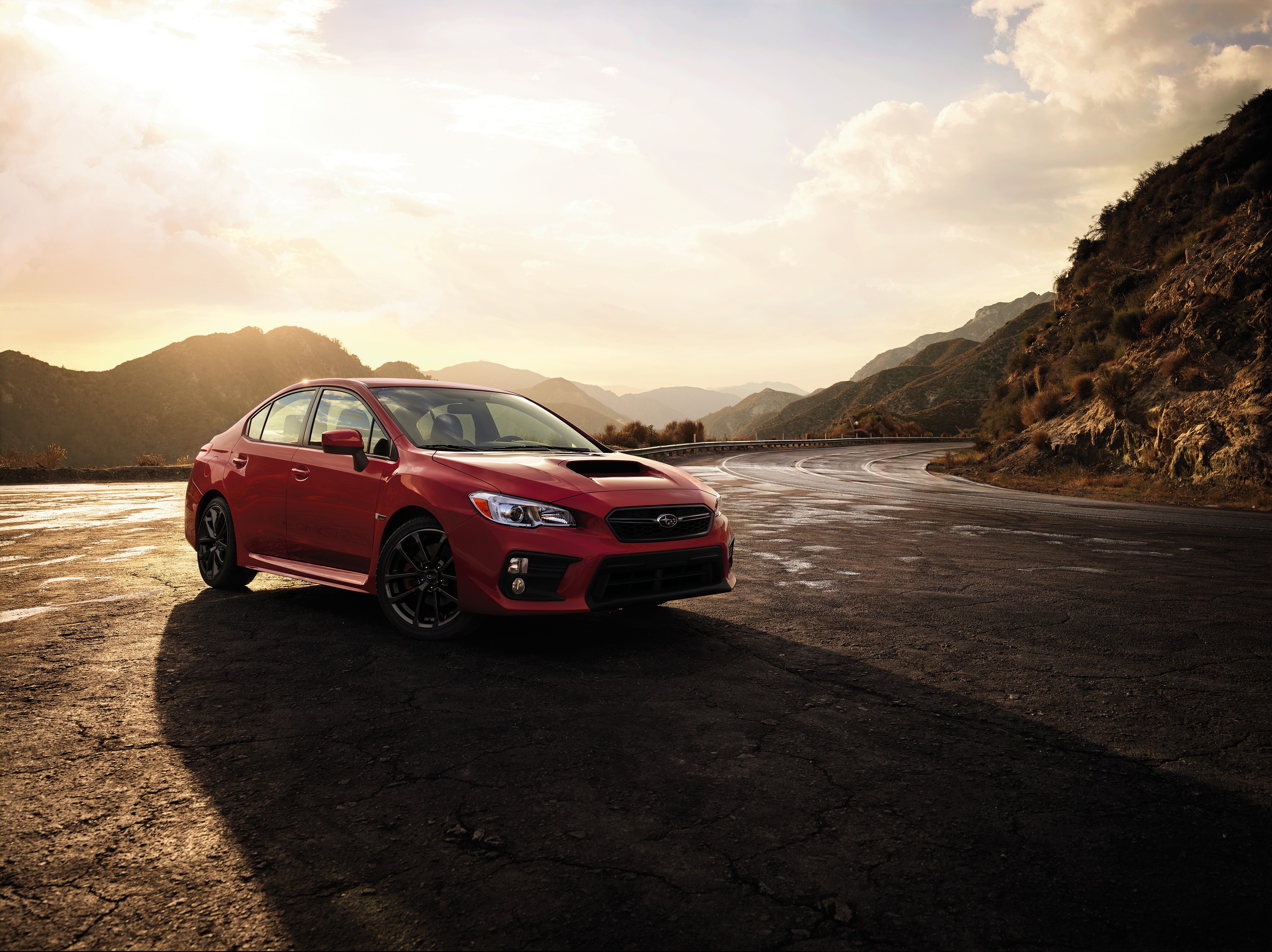 Red 2018 Subaru WRX on a Mountain Road HD Wallpaper