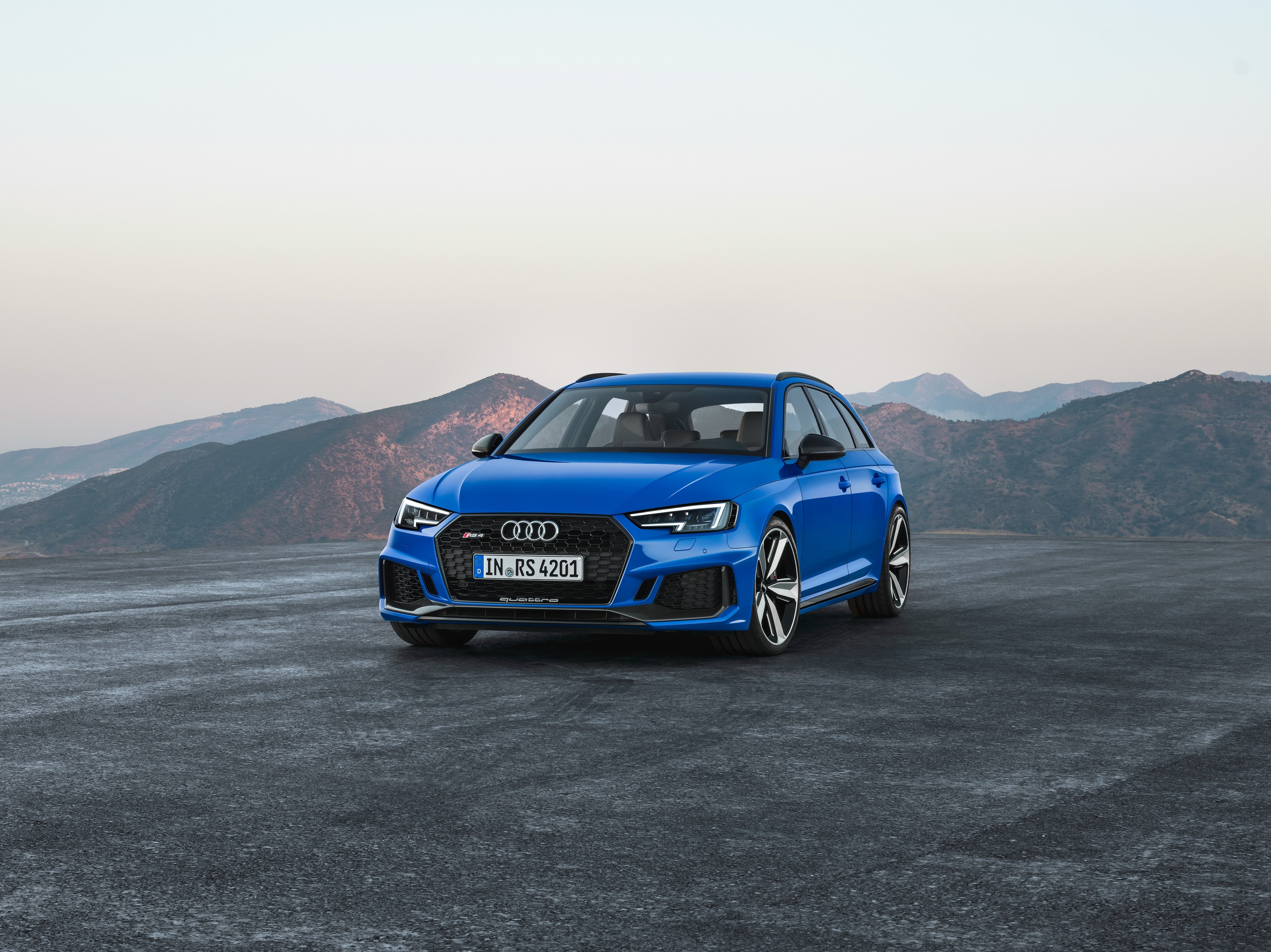 Blue Audi RS 4 Avant parked outdoors HD Wallpaper