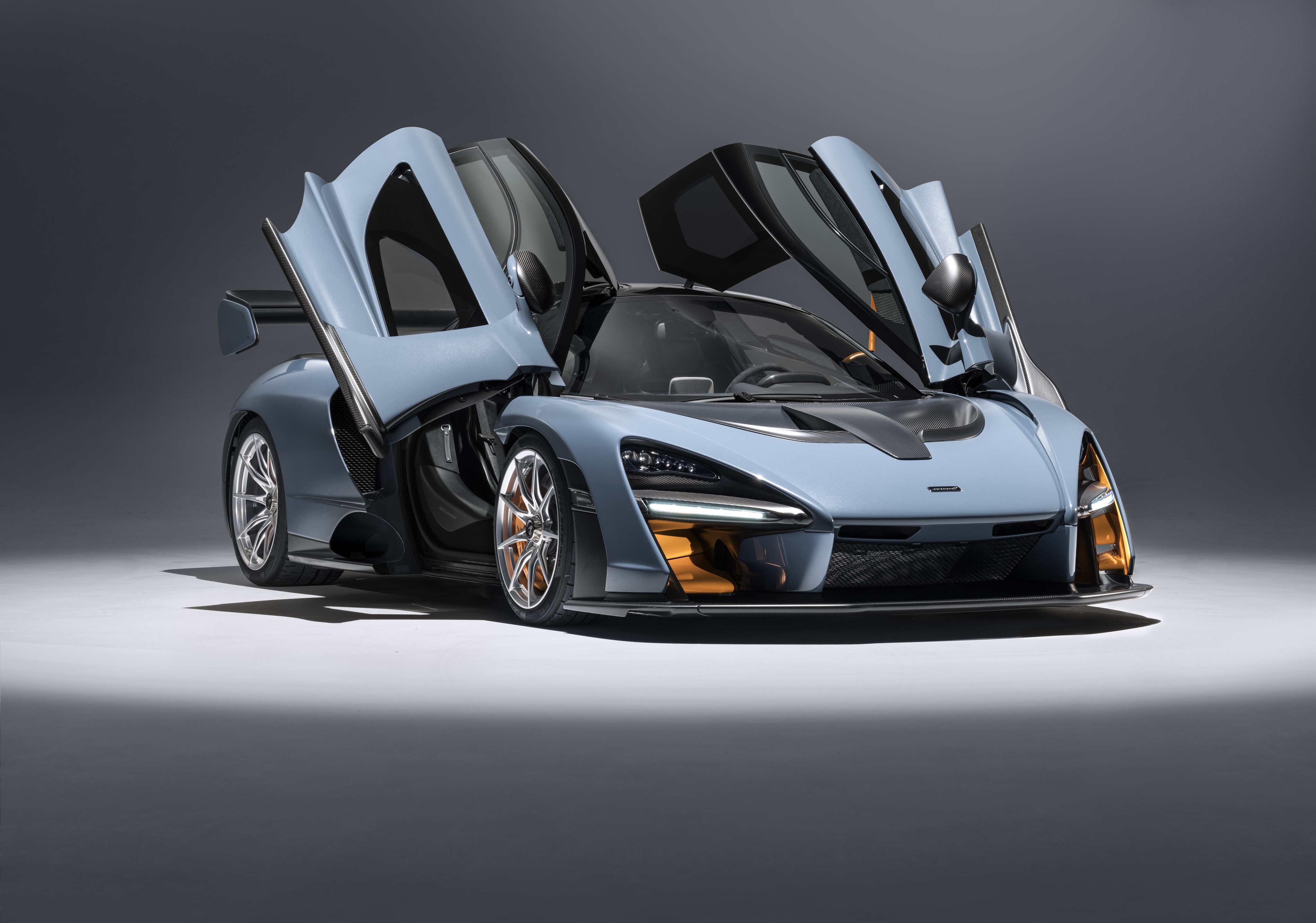 McLaren Senna with opened doors on gray background HD Wallpaper