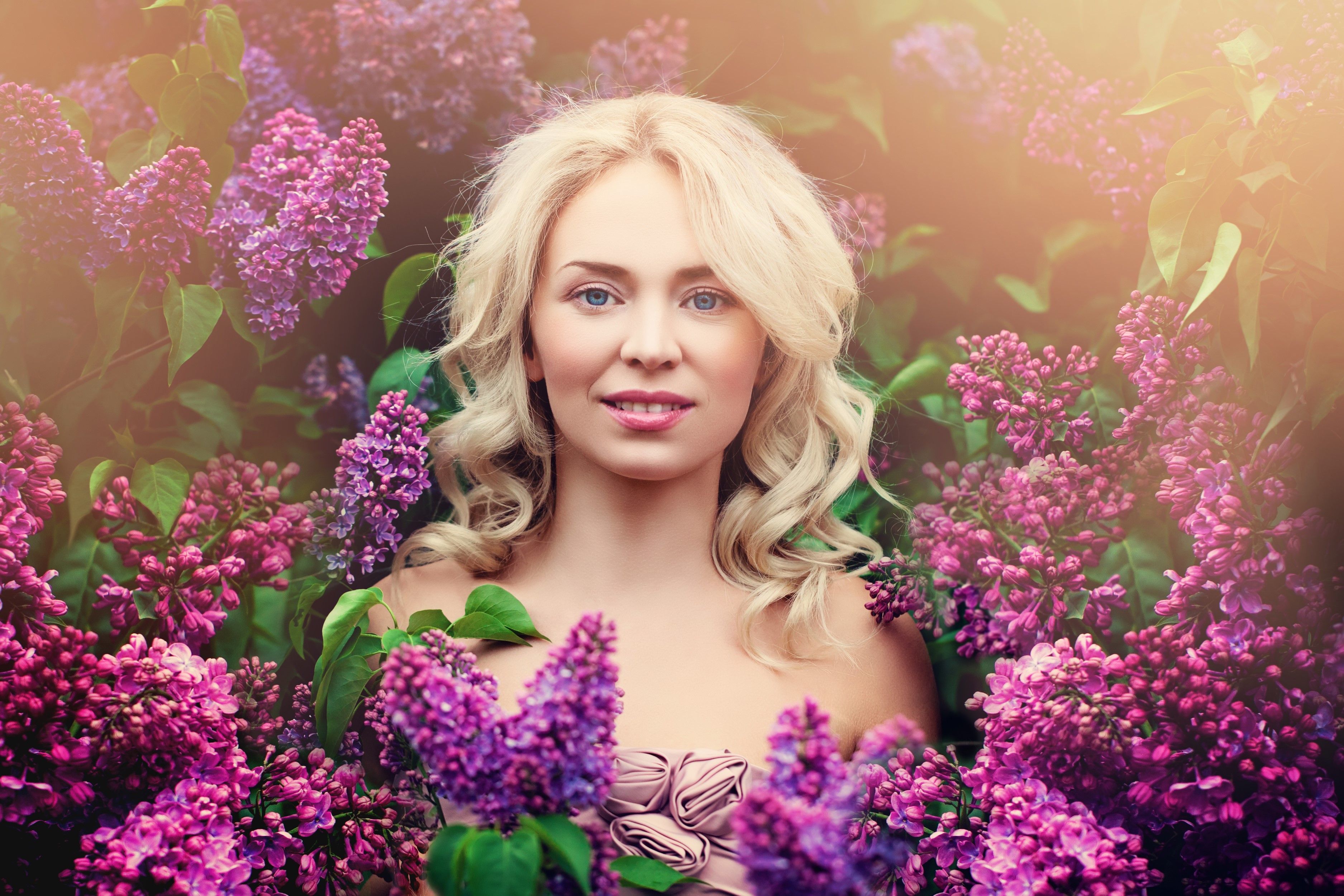 Blonde girl surrounded by lilacs HD Wallpaper