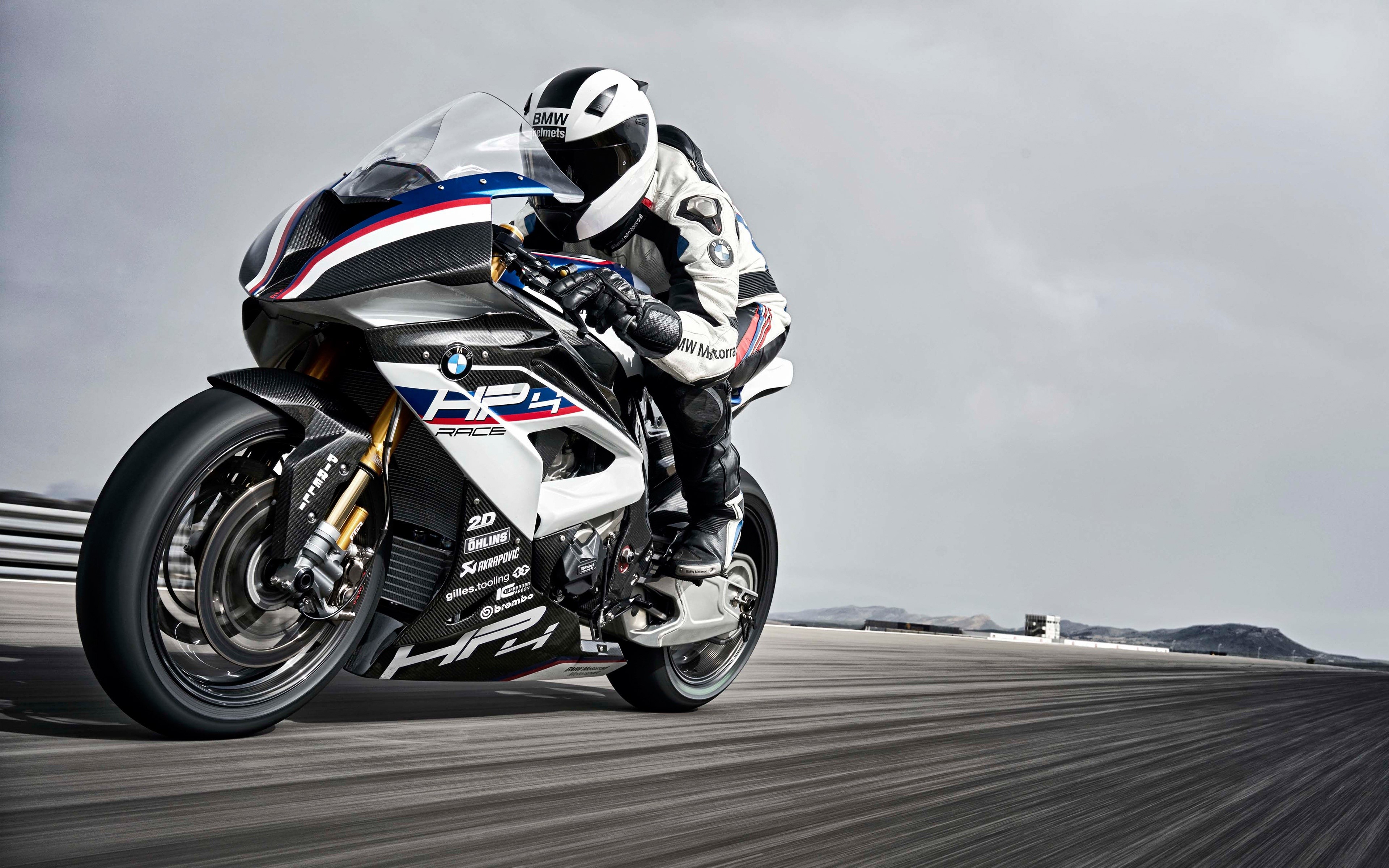 BMW HP4 Race Motorcycle with Rider HD Wallpaper