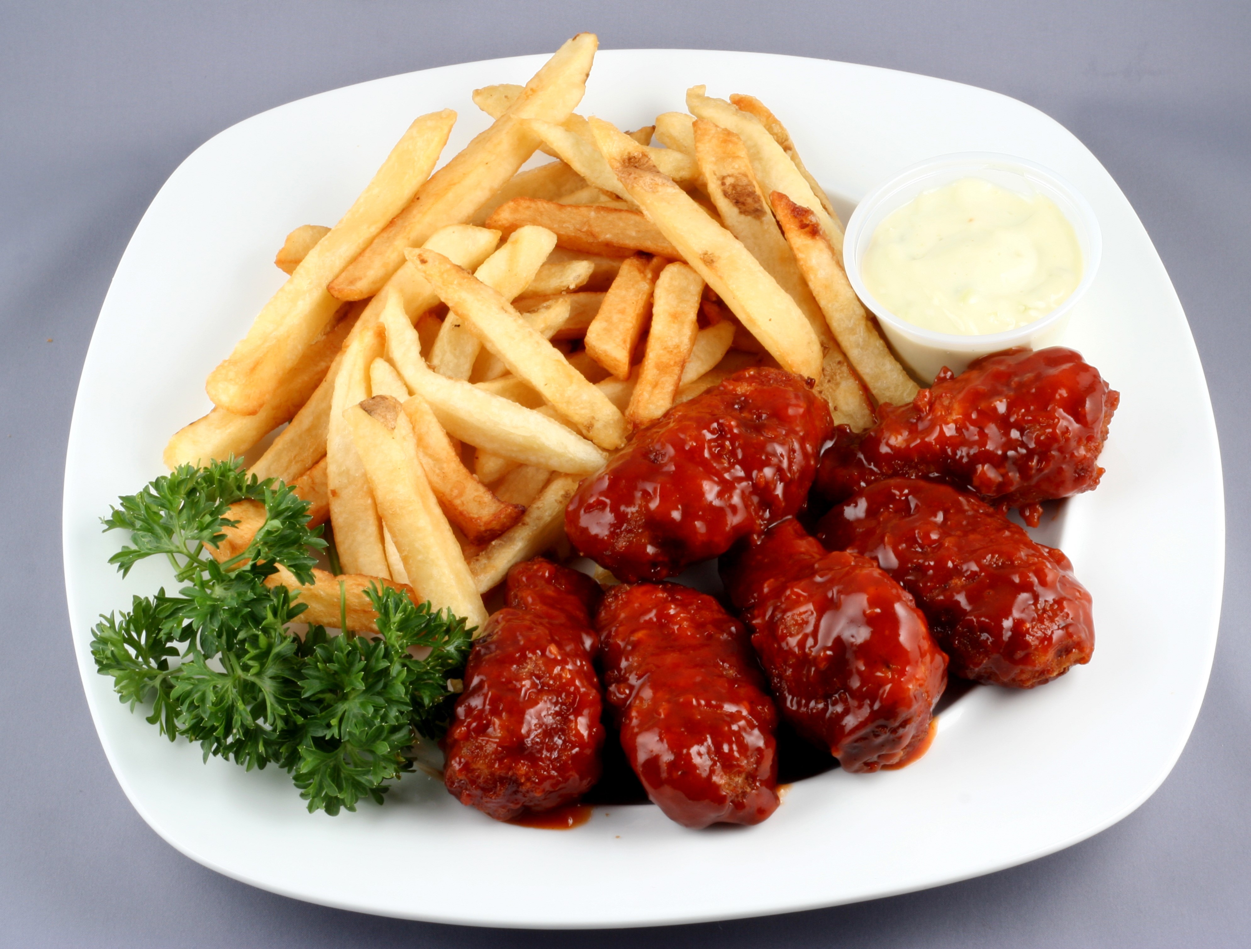 Chicken wings and french fries on a plate HD Wallpaper