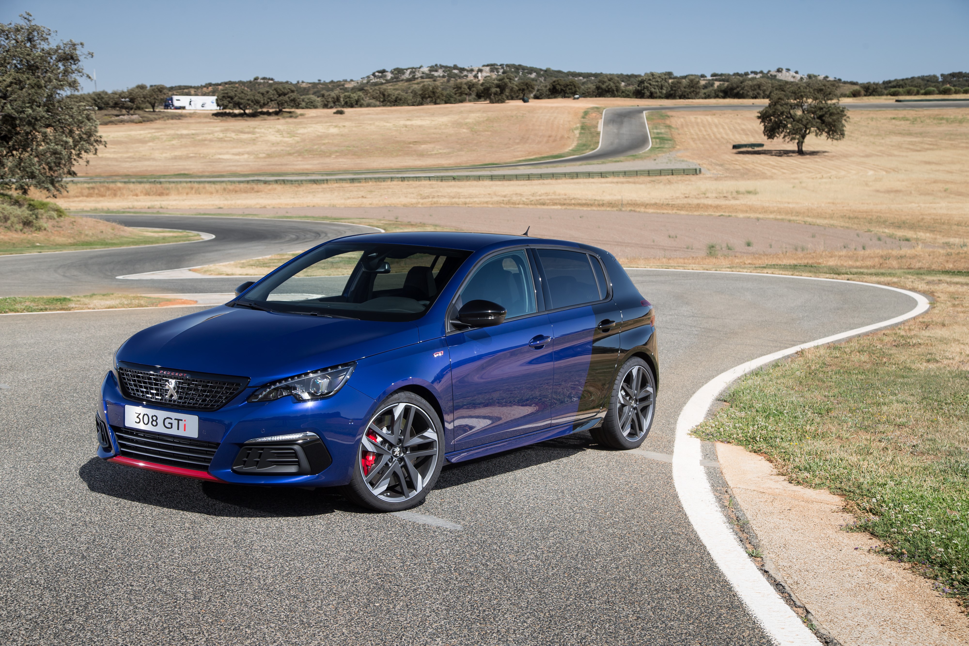 Blue 2017 Peugeot 308 GTi on a Racetrack HD Wallpaper
